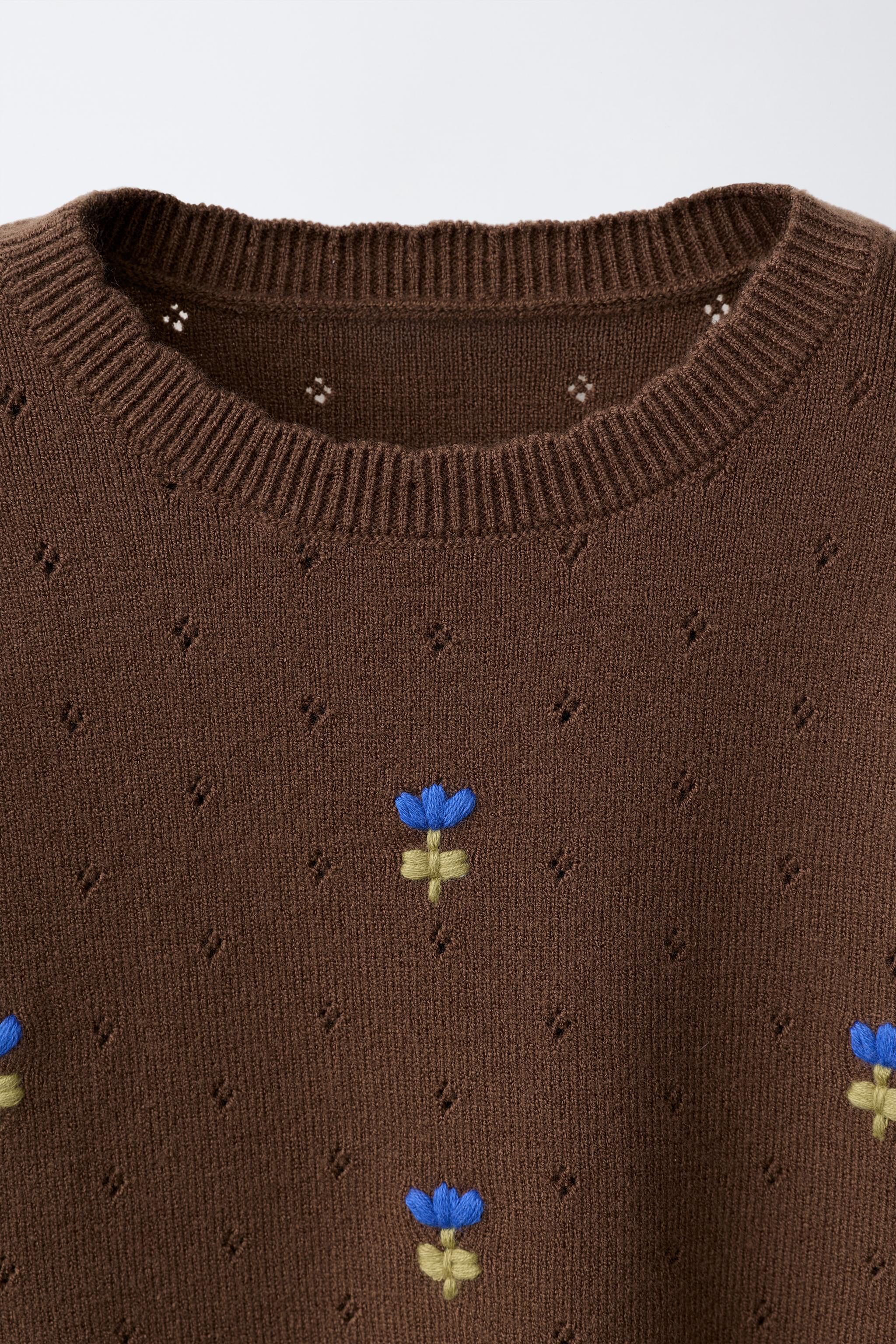 EMBROIDERED KNIT SWEATER