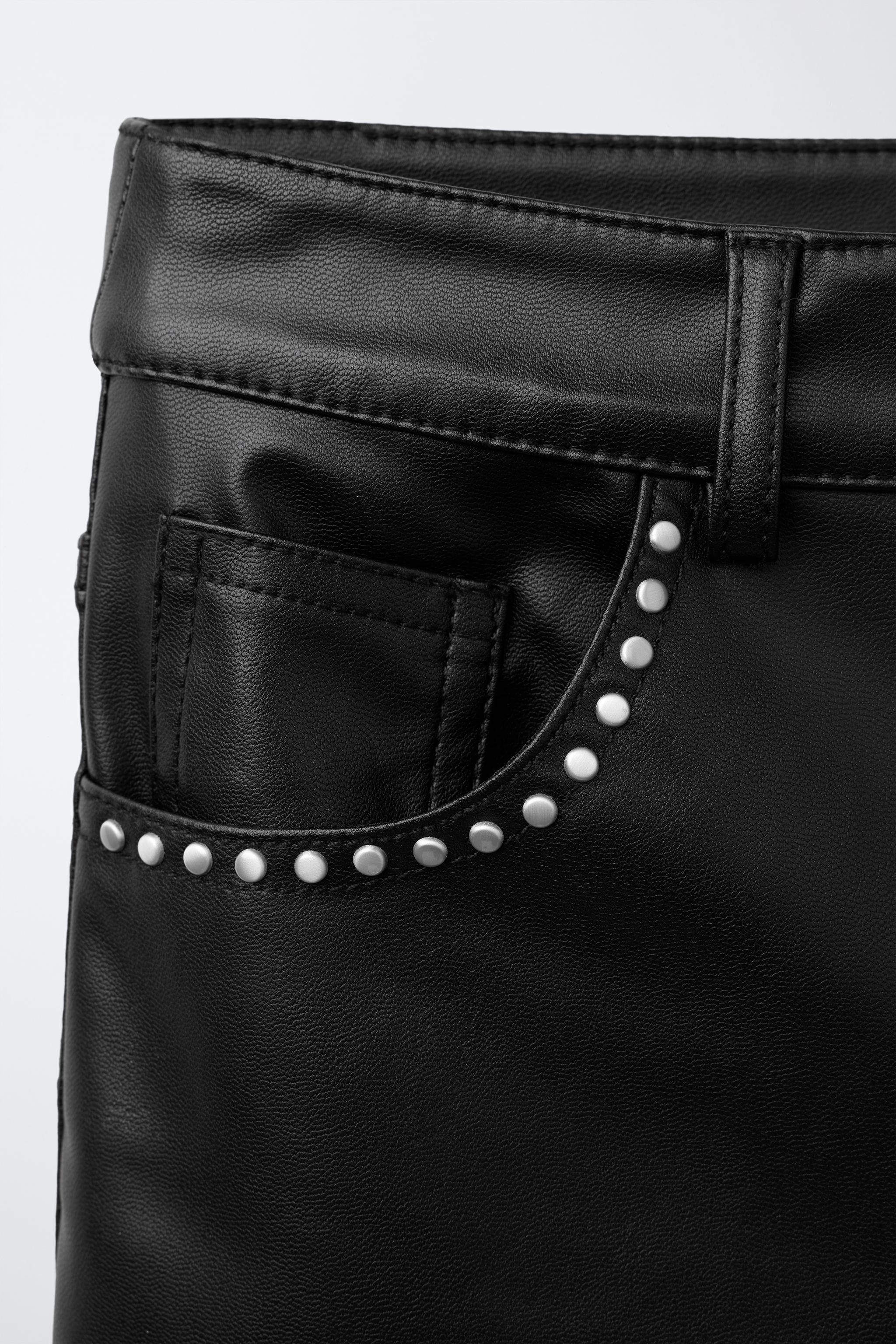 FAUX LEATHER FLARE PANTS WITH STUDS