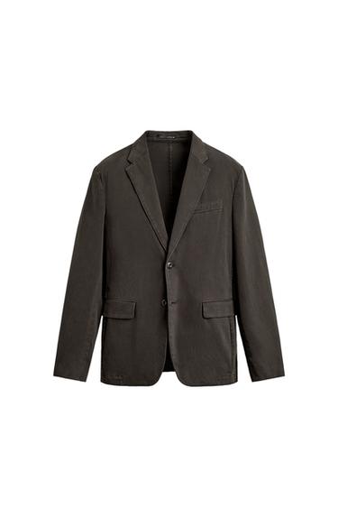 Front view of a taupe blazer with notched lapels, button fastening, chest pocket, and flap pockets at the hip.