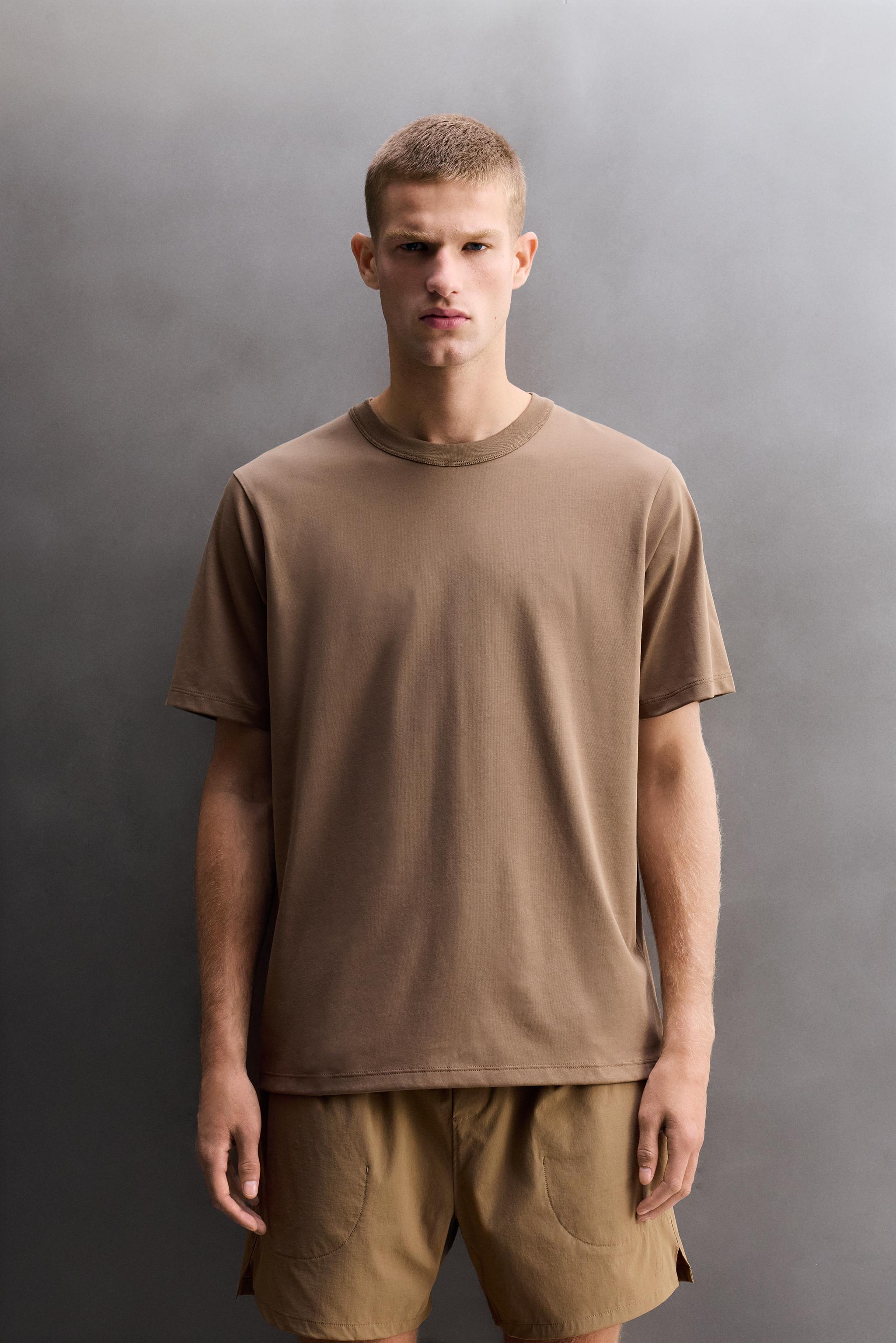 COMFORT TRAINING T-SHIRT — Sand