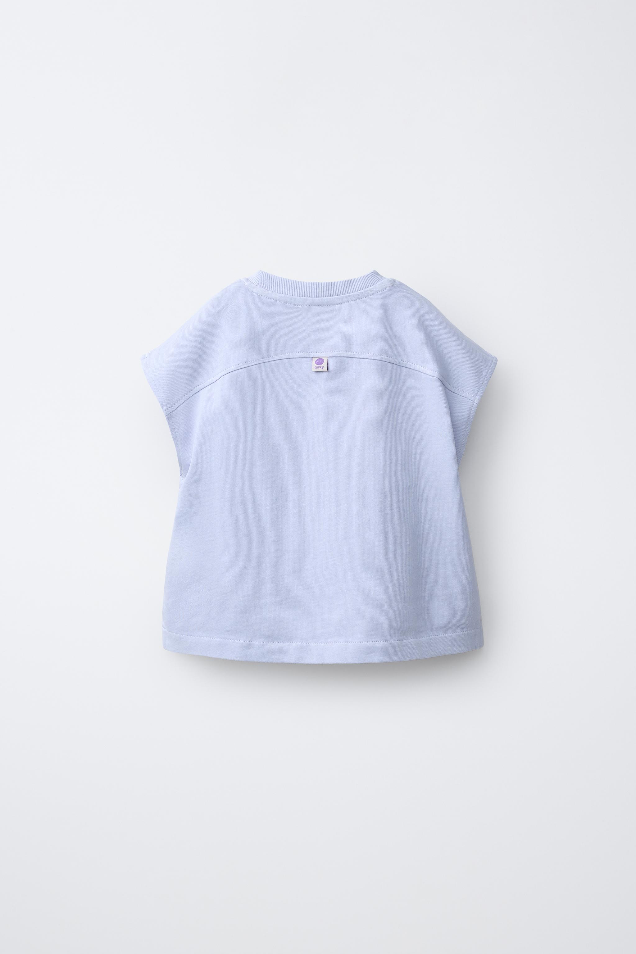T-SHIRT UNI À ÉTIQUETTE