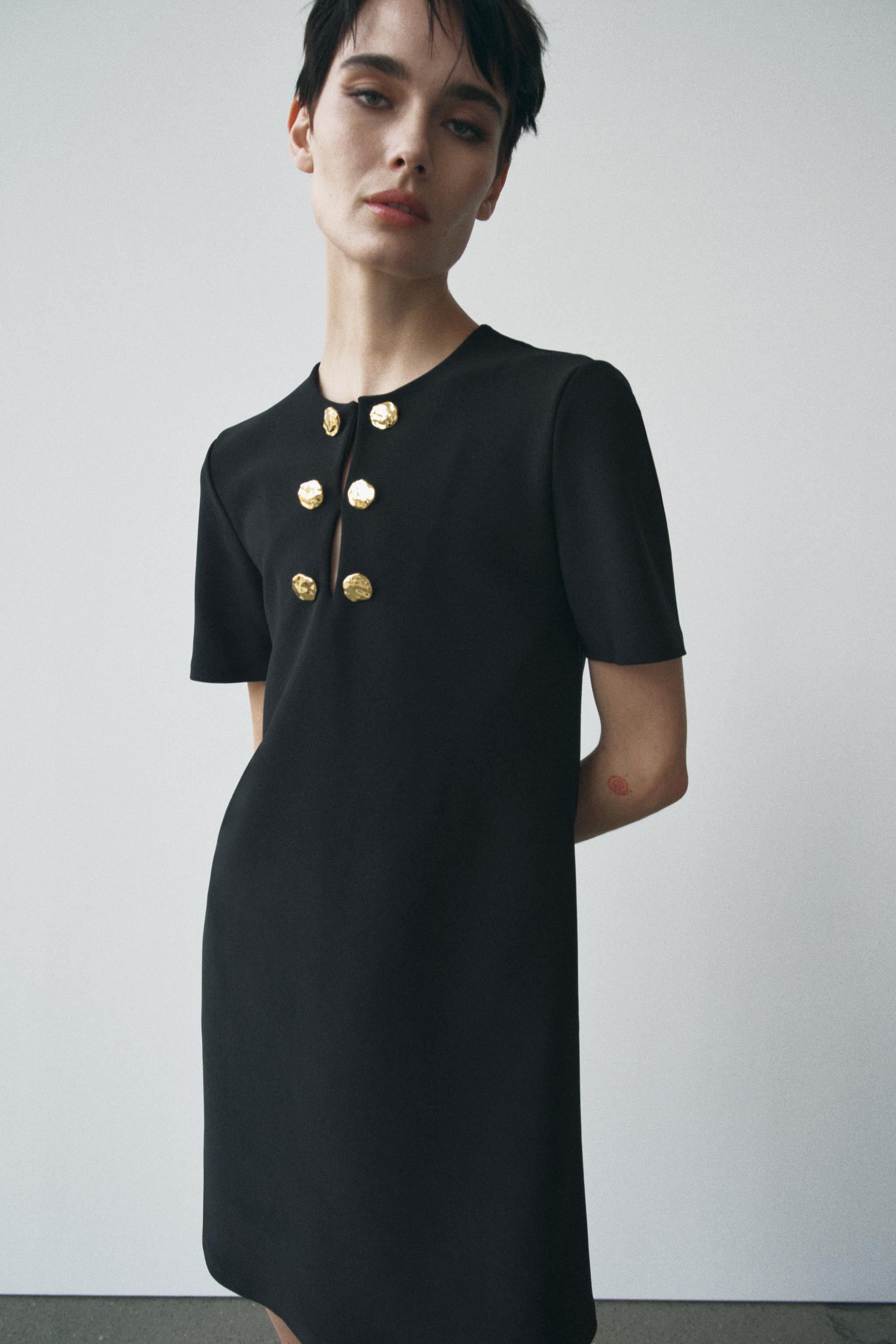 Zara shops black dress with buttons