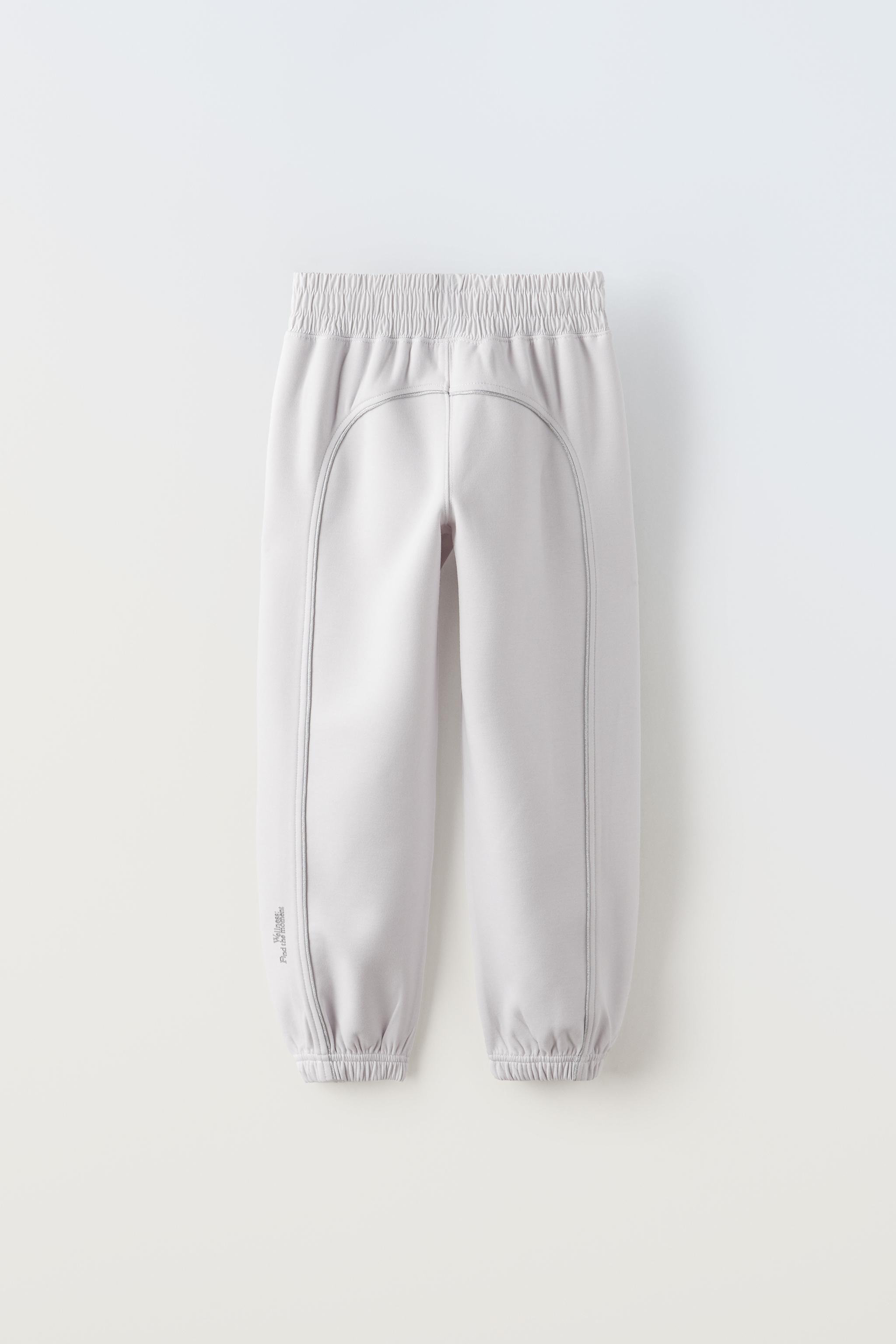 SPORTY JOGGERS WITH SHIMMERY TRIMS