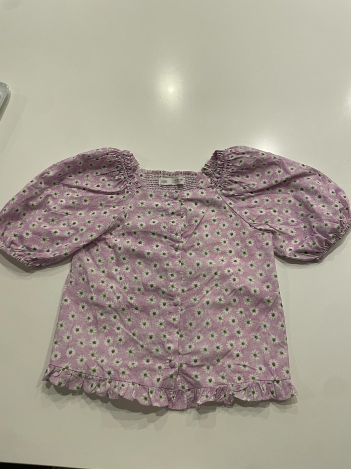RUFFLED DAISY BLOUSE