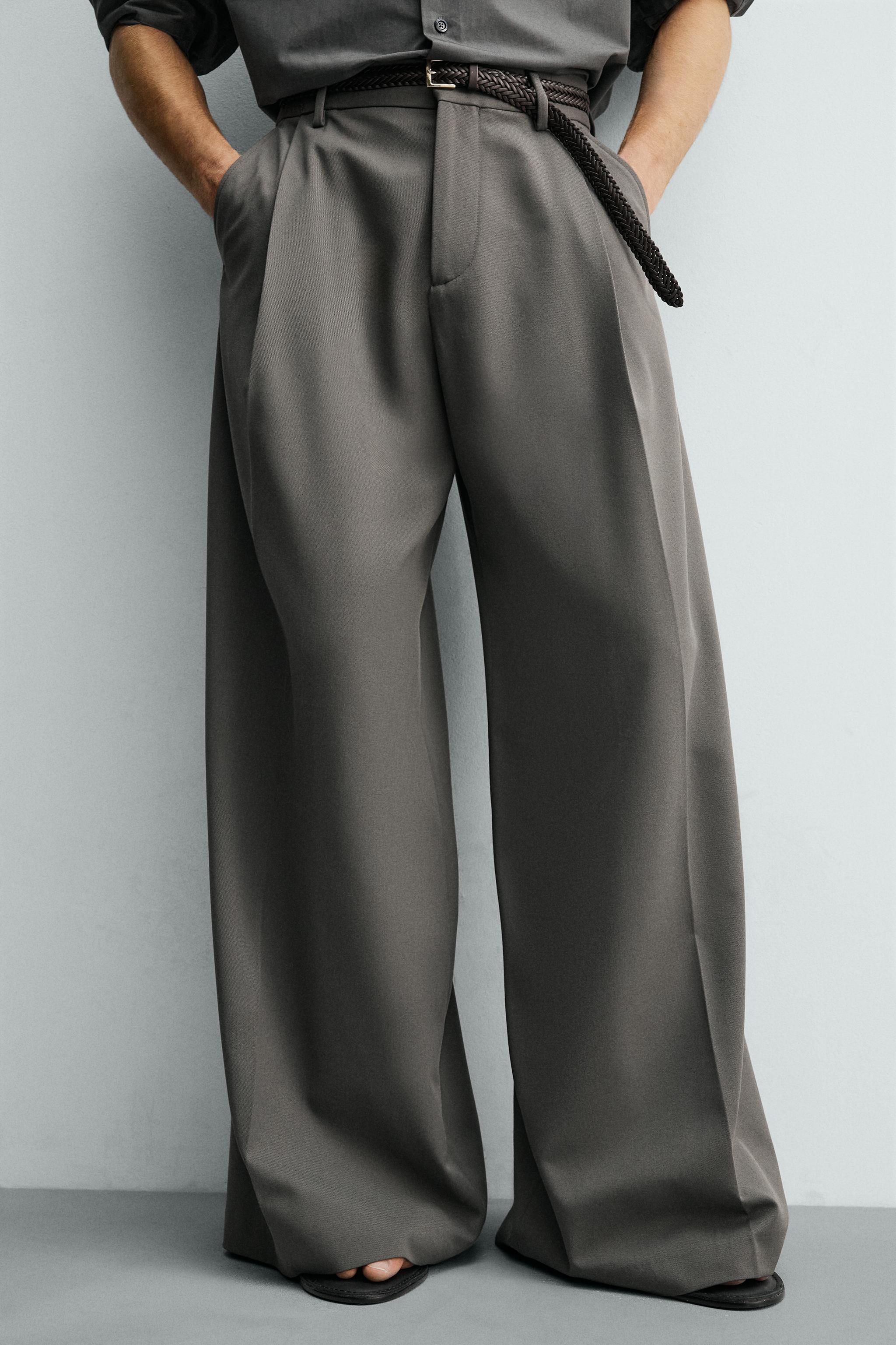 PLEATED WIDE FIT PANTS