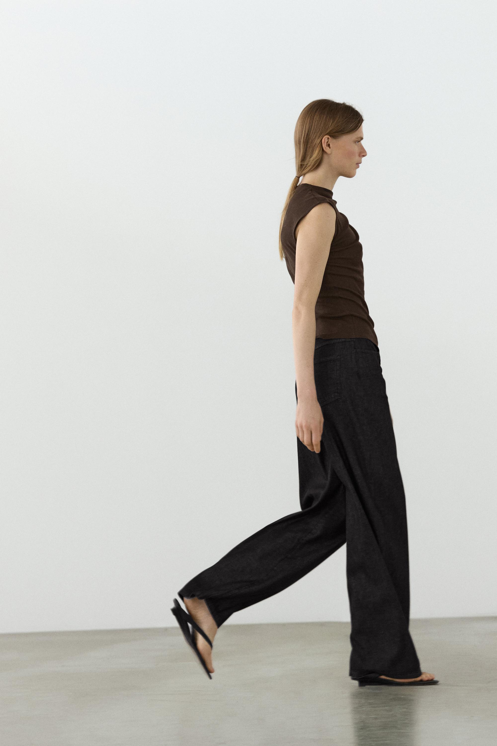 Asymmetric top with rhinestone detail