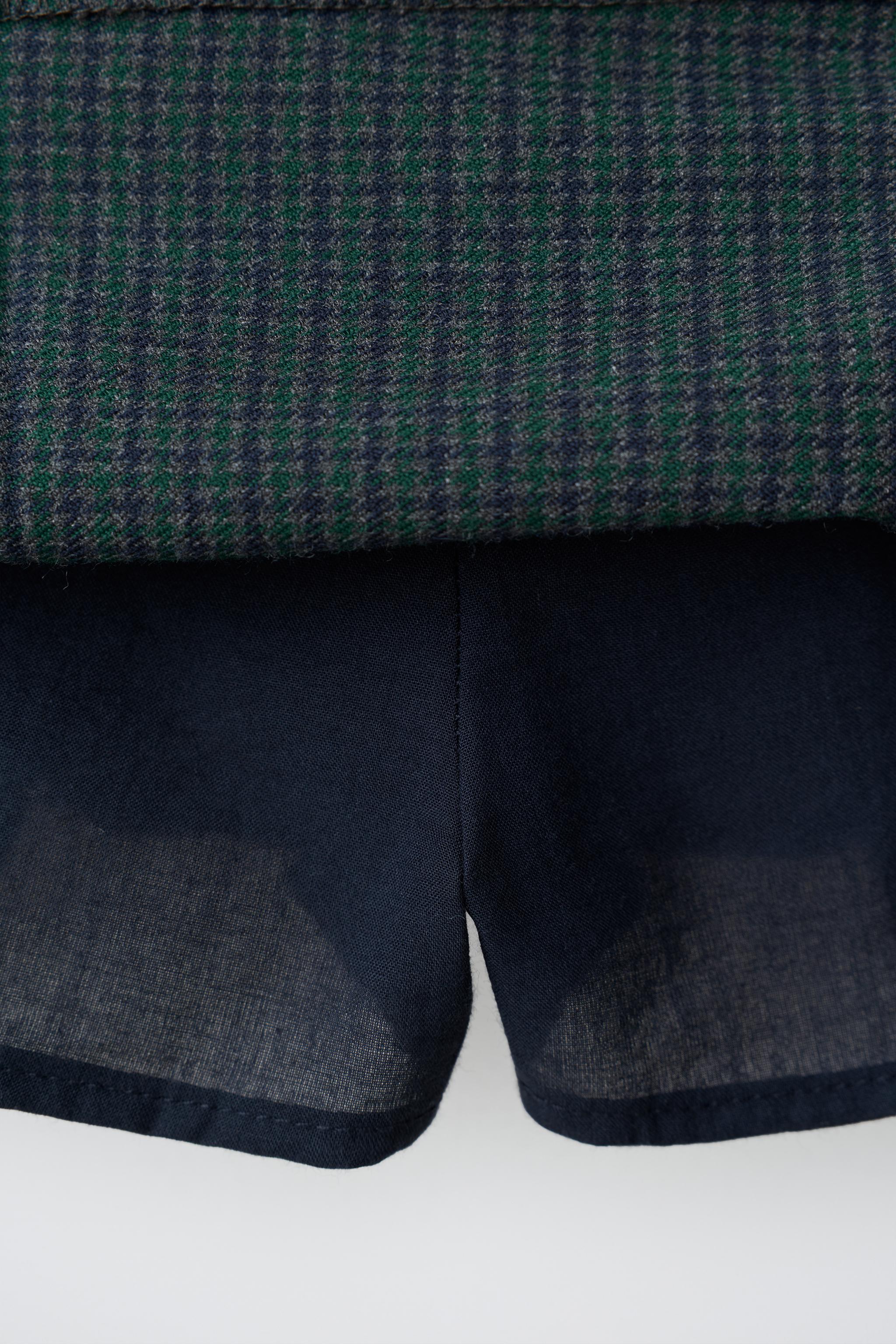 PLAID PLEATED SKIRT WITH BUCKLE