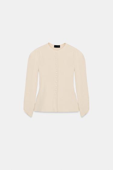 CHAQUETA PUNTO MANGA ABULLONADA - Crudo medio de Zara