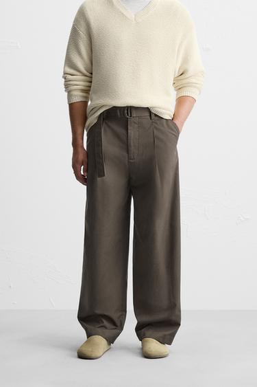 PANTALÓN PLIEGUES CINTURÓN - Gris topo de Zara