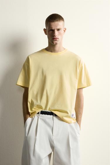 CAMISETA RELAXED FIT GRÁFICO SOL - Mantequilla de Zara