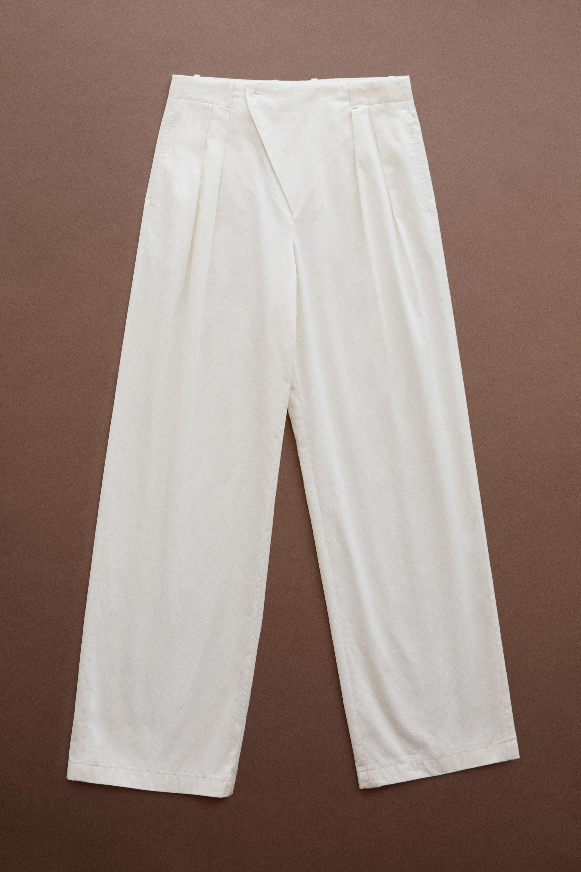 Pleated pants with crossover fastening detail - STUDIO — Ecru