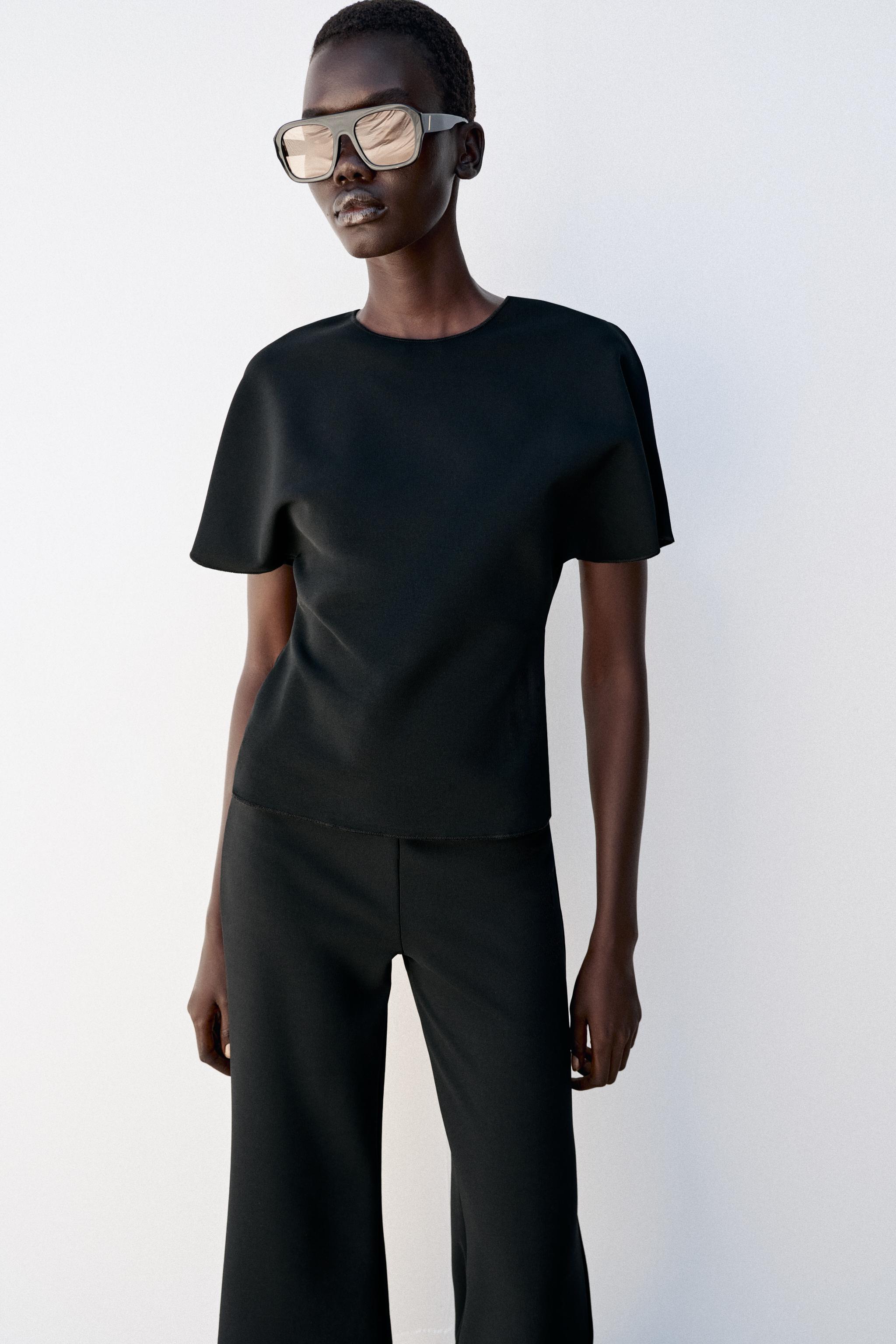 SHORT SLEEVE CUT OUT TOP