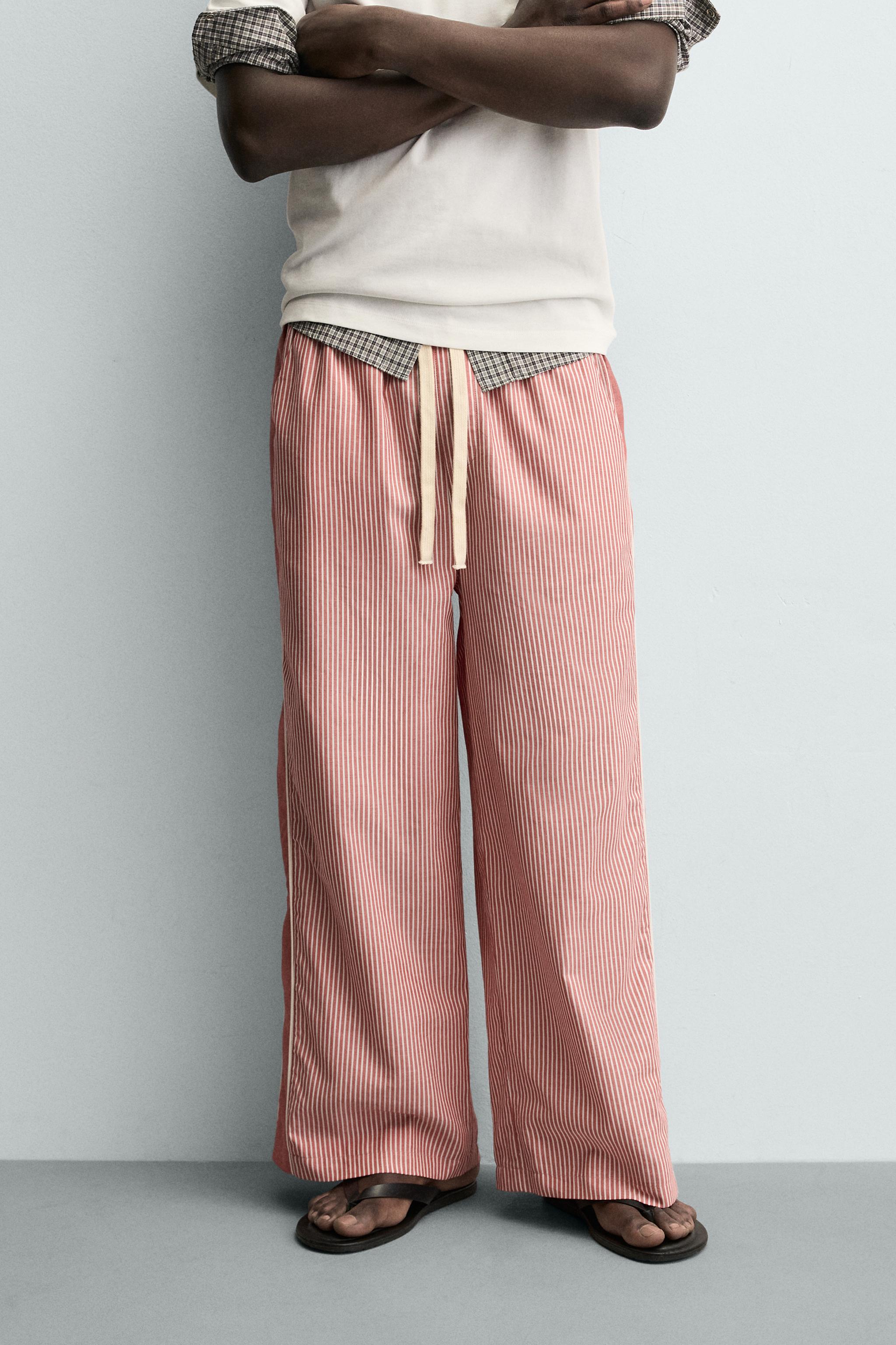 PANTALON À RAYURES ET BANDE EN CONTRASTE