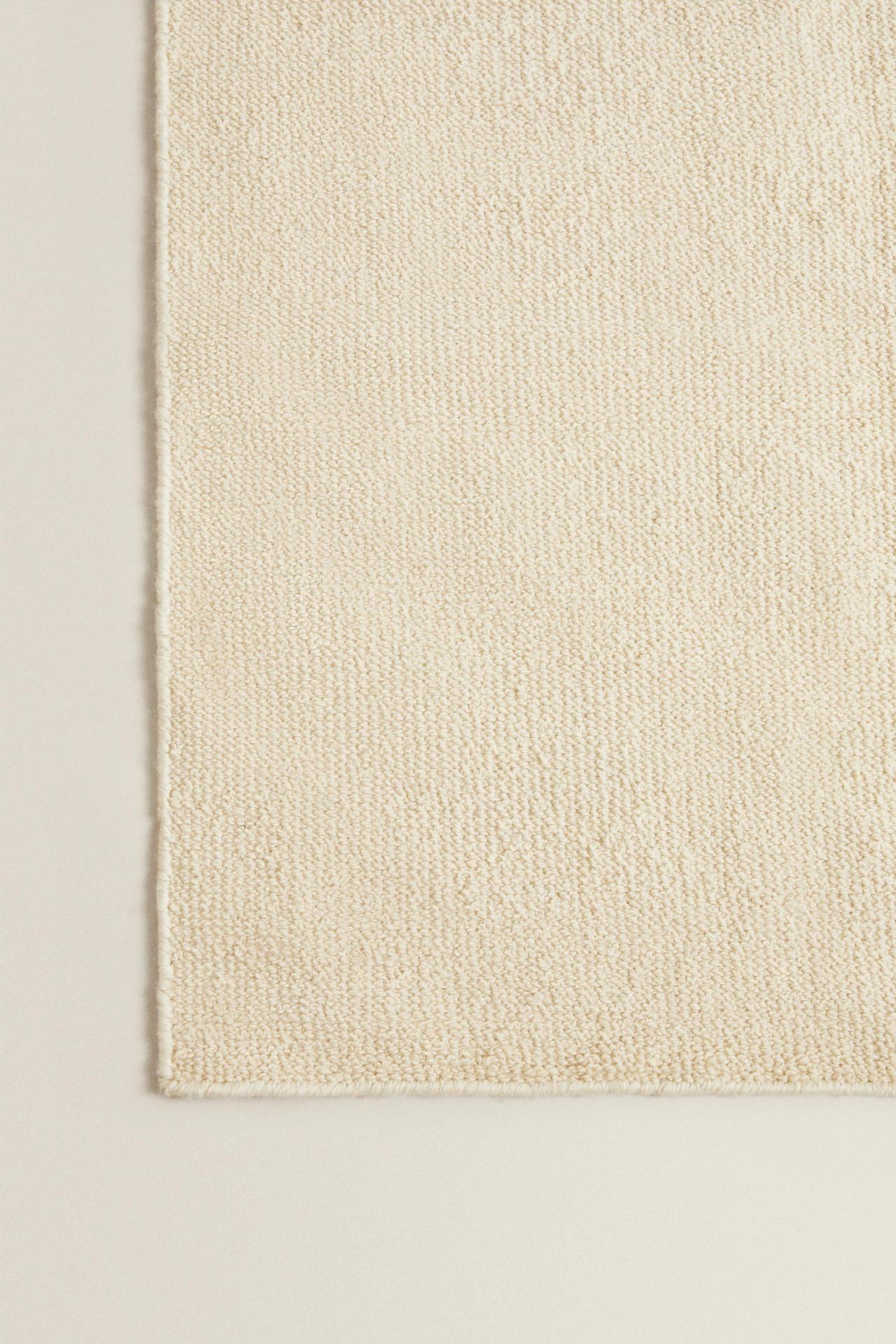 WAVY WOOL RUG — Oyster-white