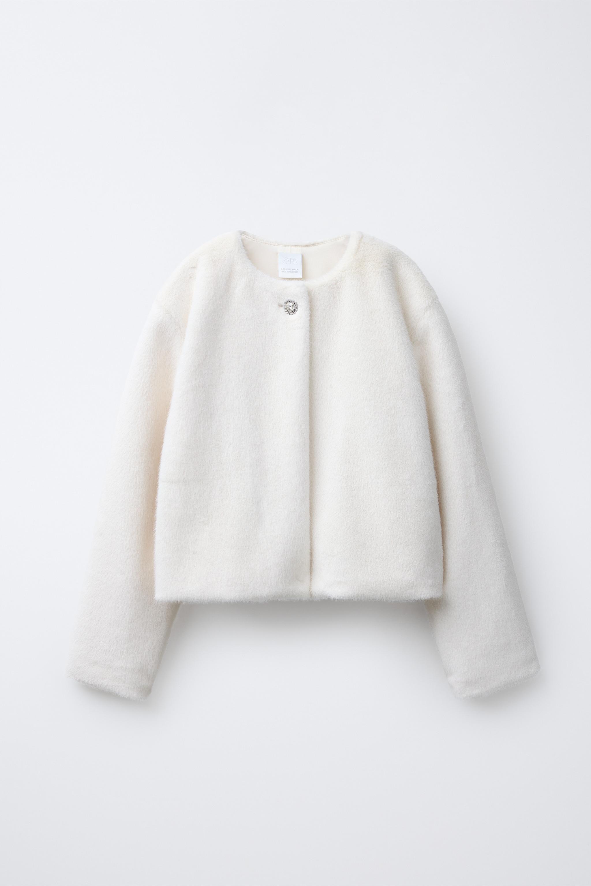 VESTE BOLÉRO EN FAUSSE FOURRURE