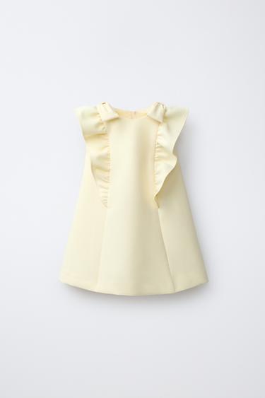 VESTITO CON VOLANT E FIOCCHI - Giallo pastello di Zara