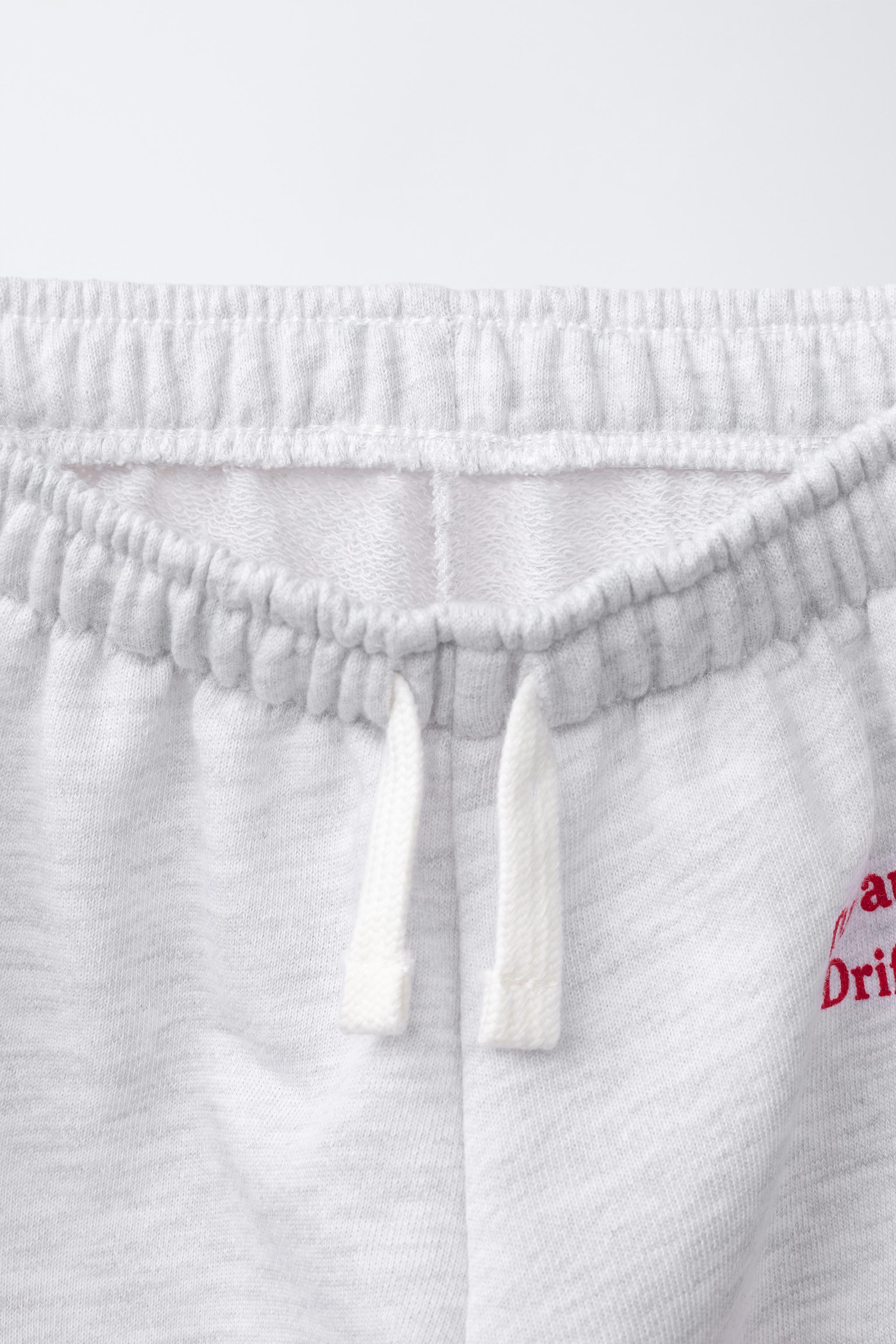 EMBROIDERED FLAG JOGGER PANTS