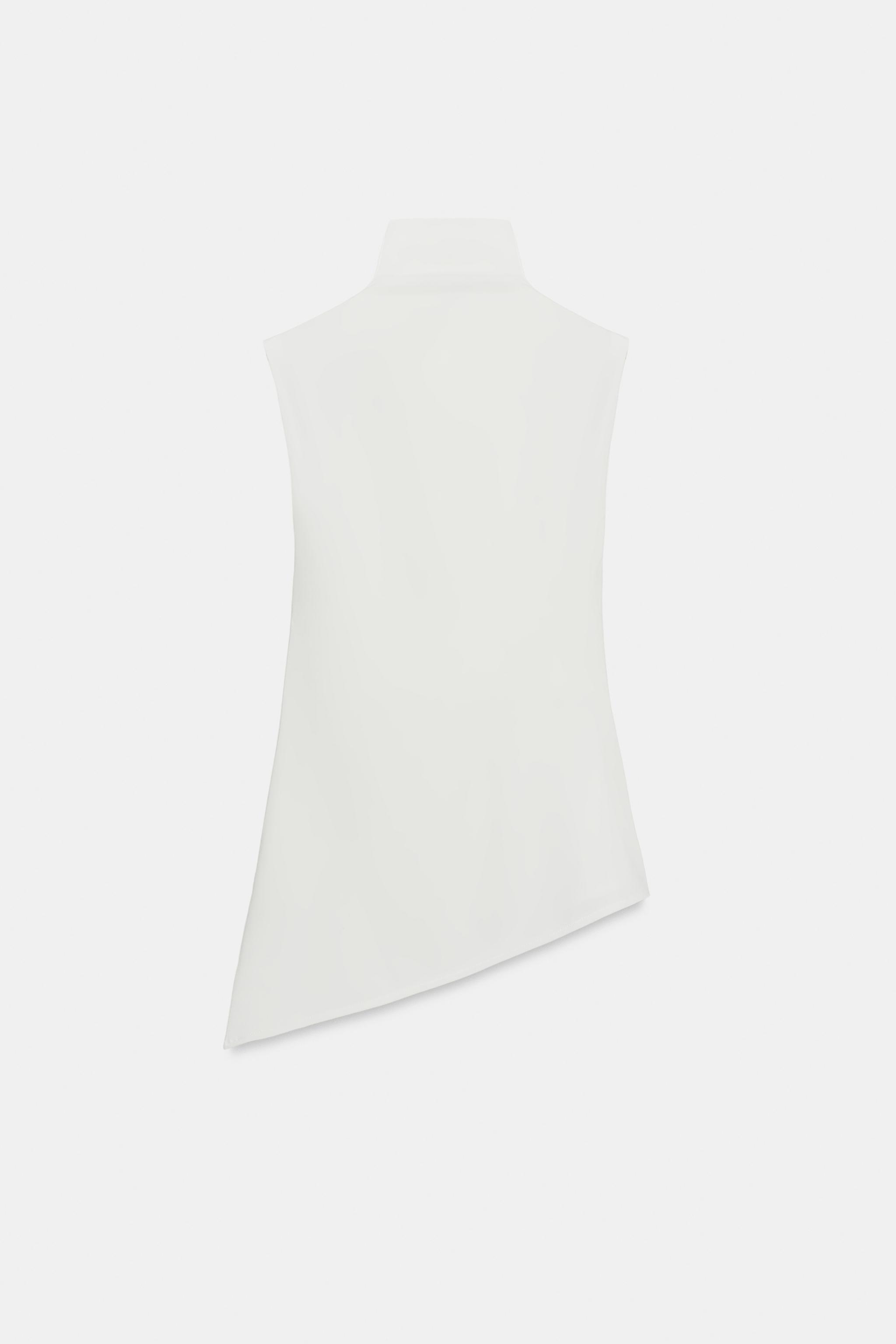 TOP FLUIDE ASYMÉTRIQUE