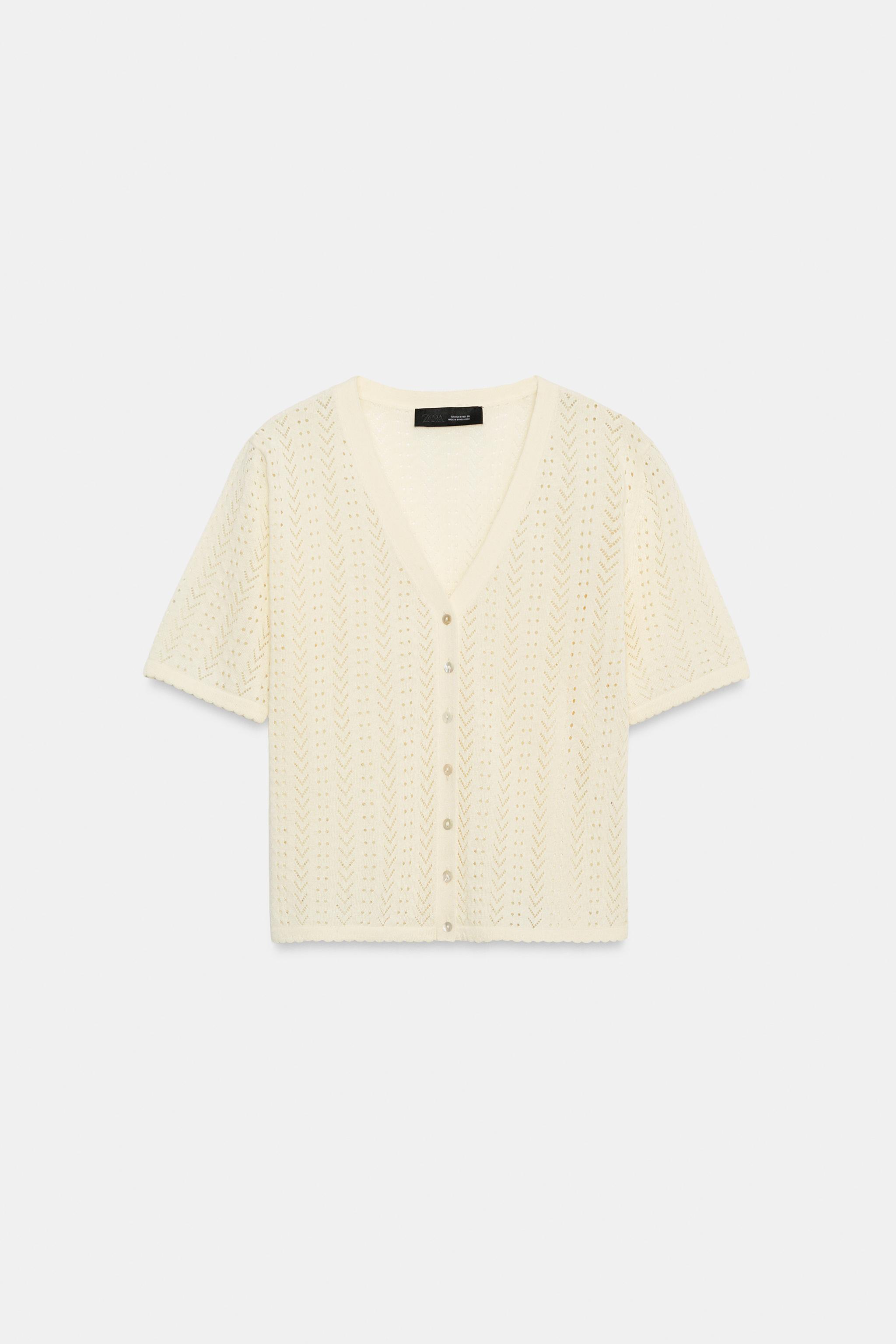GILET EN MAILLE POINTELLE MANCHES COURTES