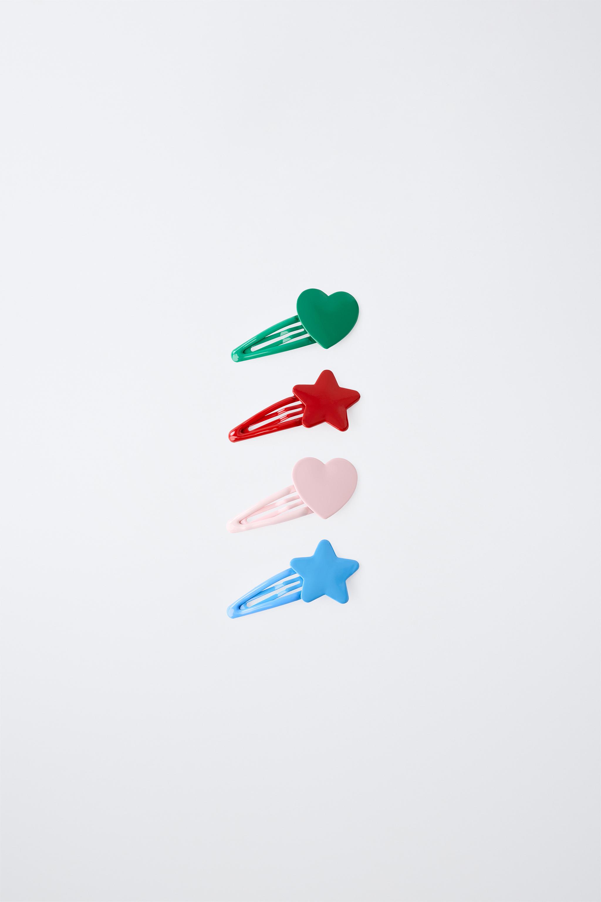 FOUR-PACK OF STAR AND HEART HAIR CLIPS — Multicolored