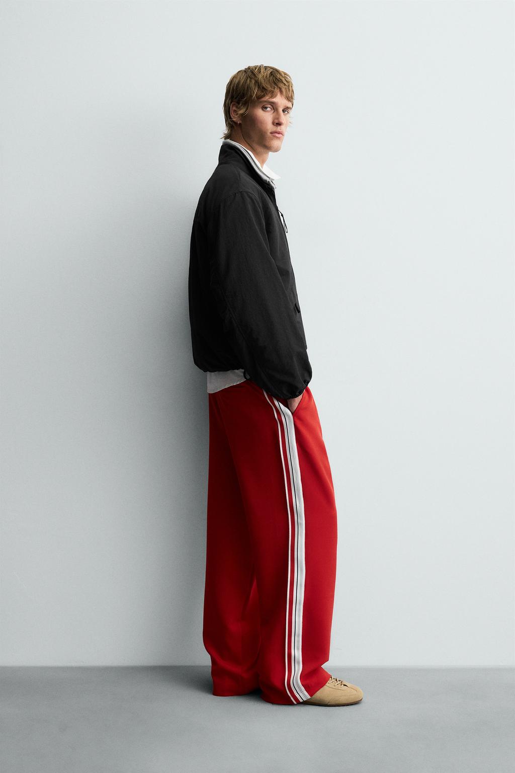 WIDE FIT JOGGER PANTS WITH SIDE STRIPES