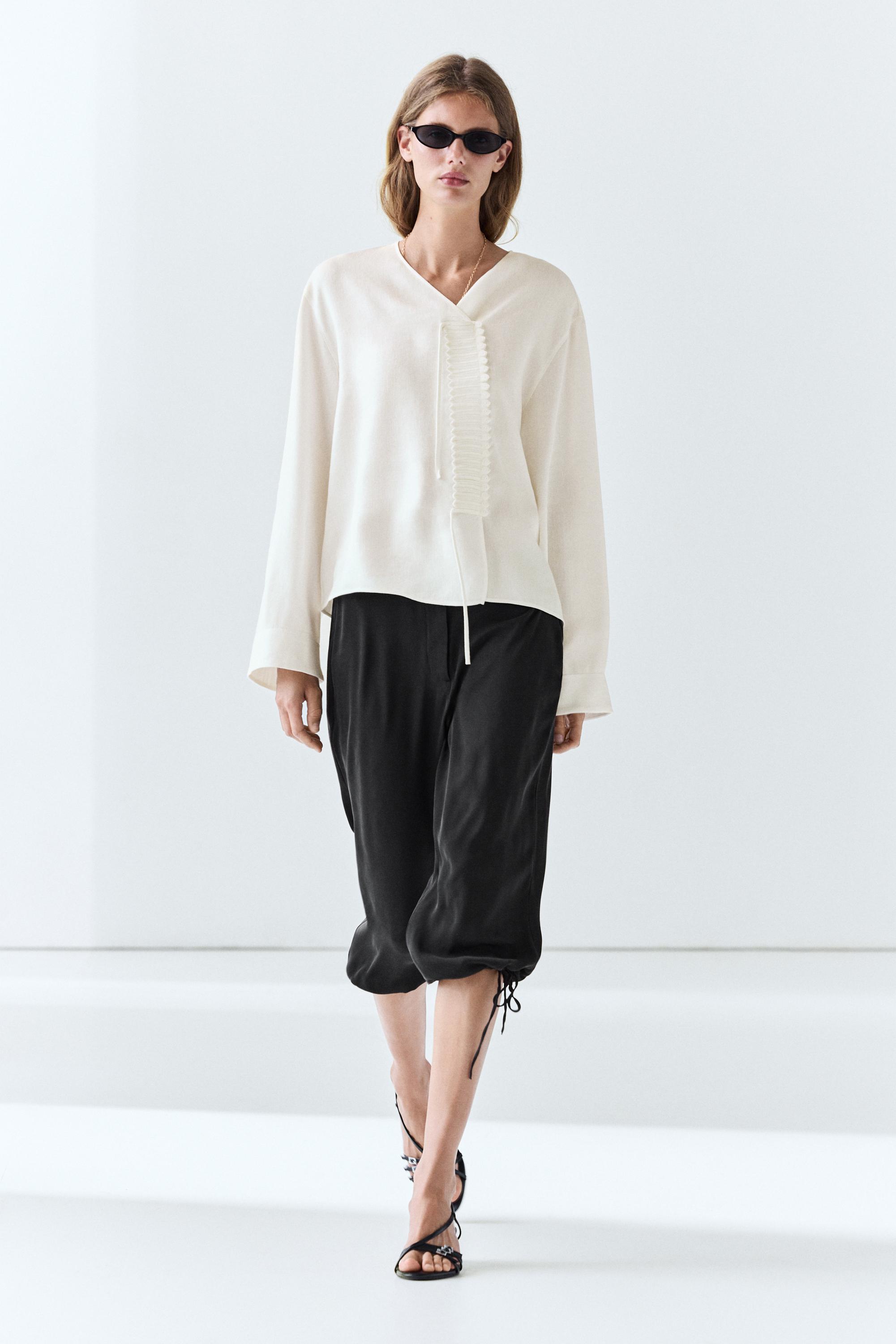Flowing linen blend blouse with button detail