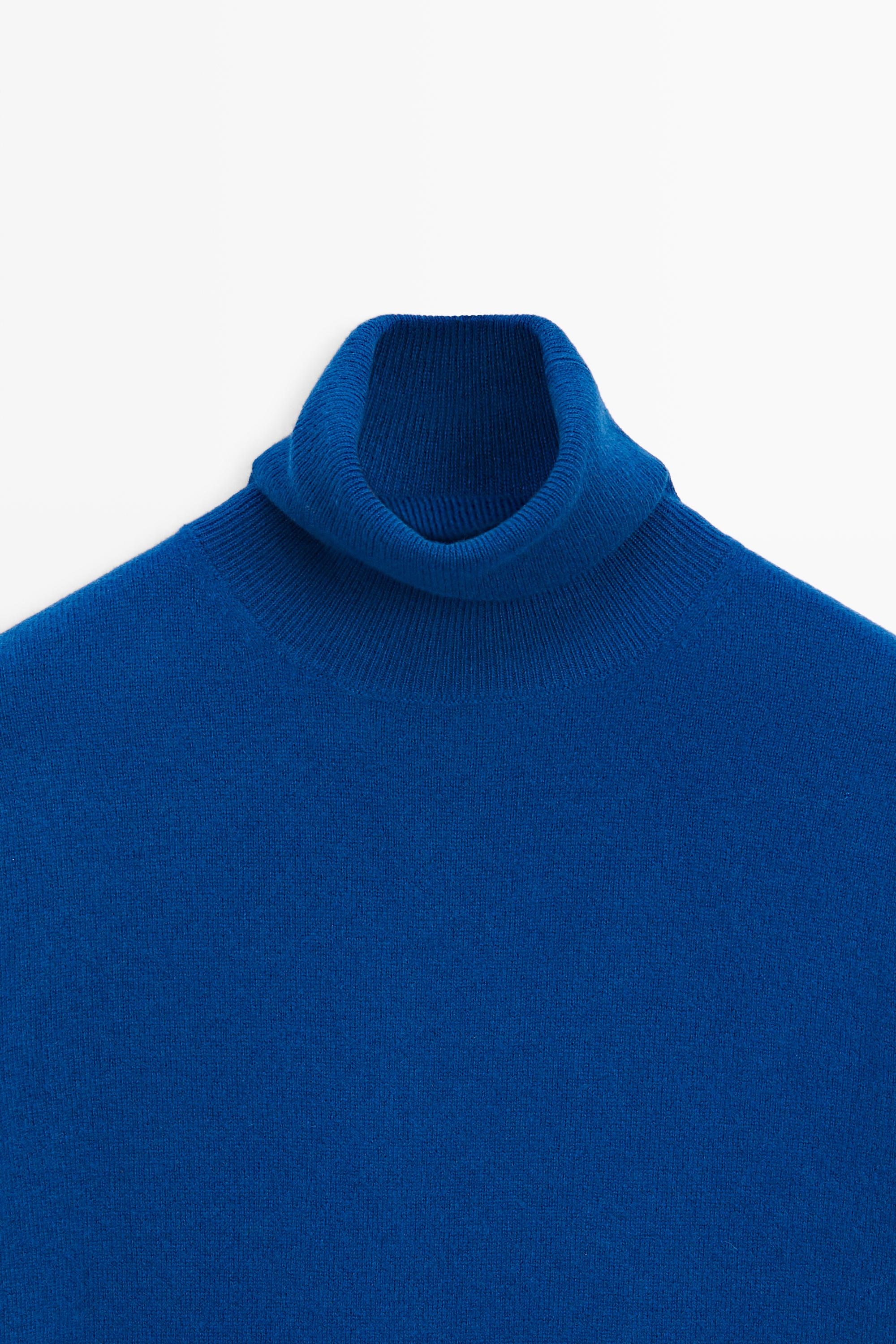 Pull maille col roulé manches courtes