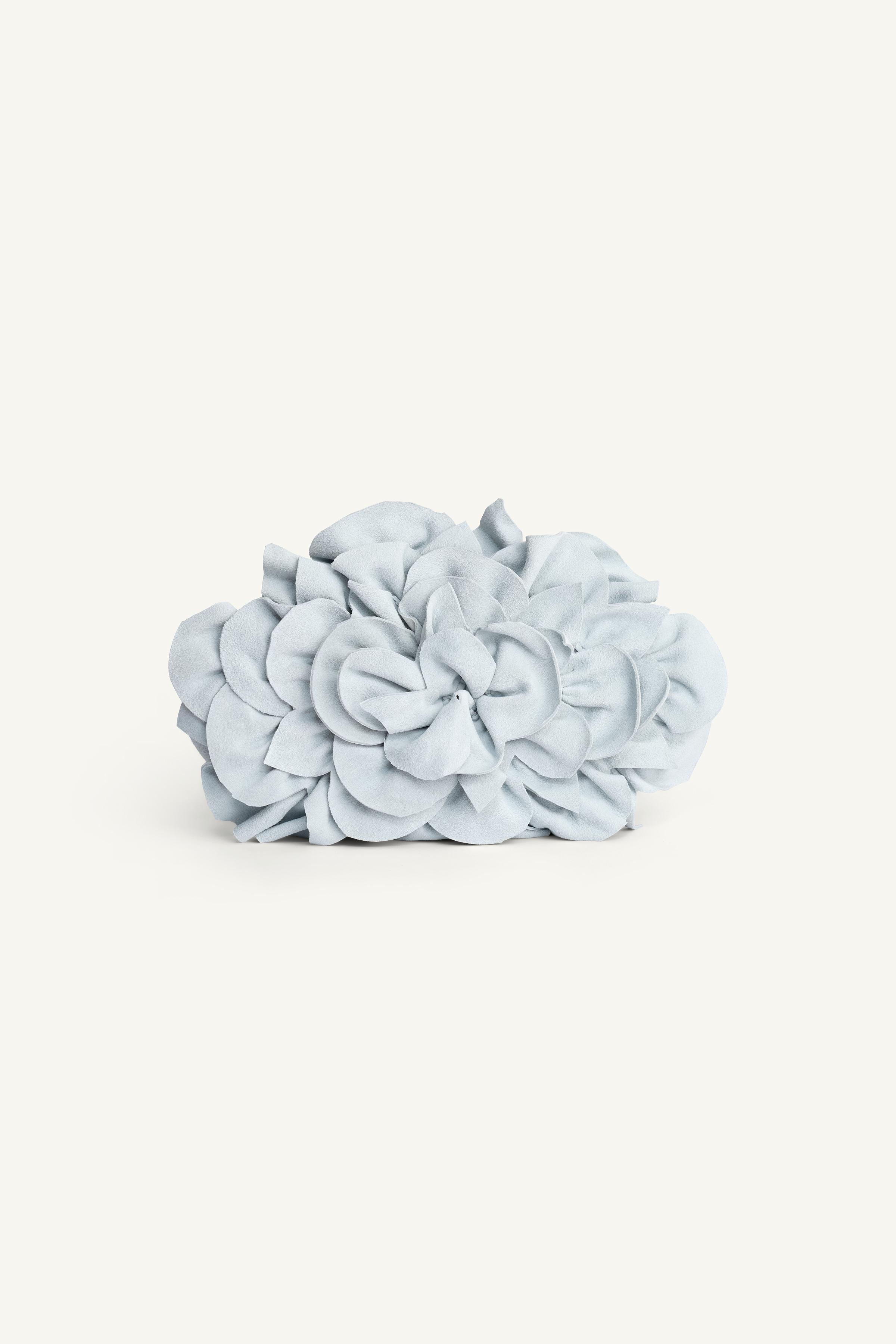 POCHETTE EN CUIR FLEUR ÉDITION LIMITÉE