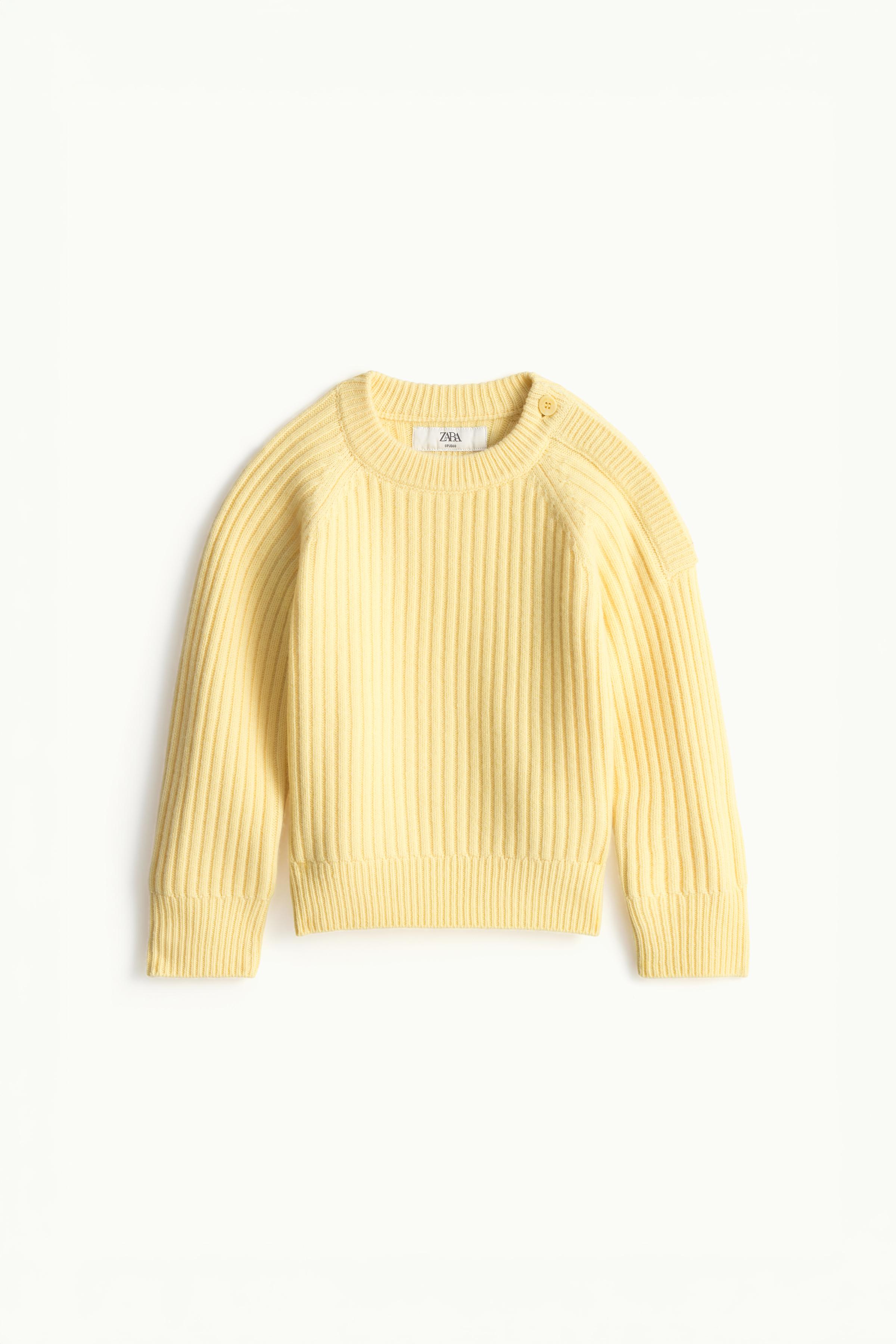 PULL 100 % LAINE CANNELÉ BOUTONS ÉDITION LIMITÉE