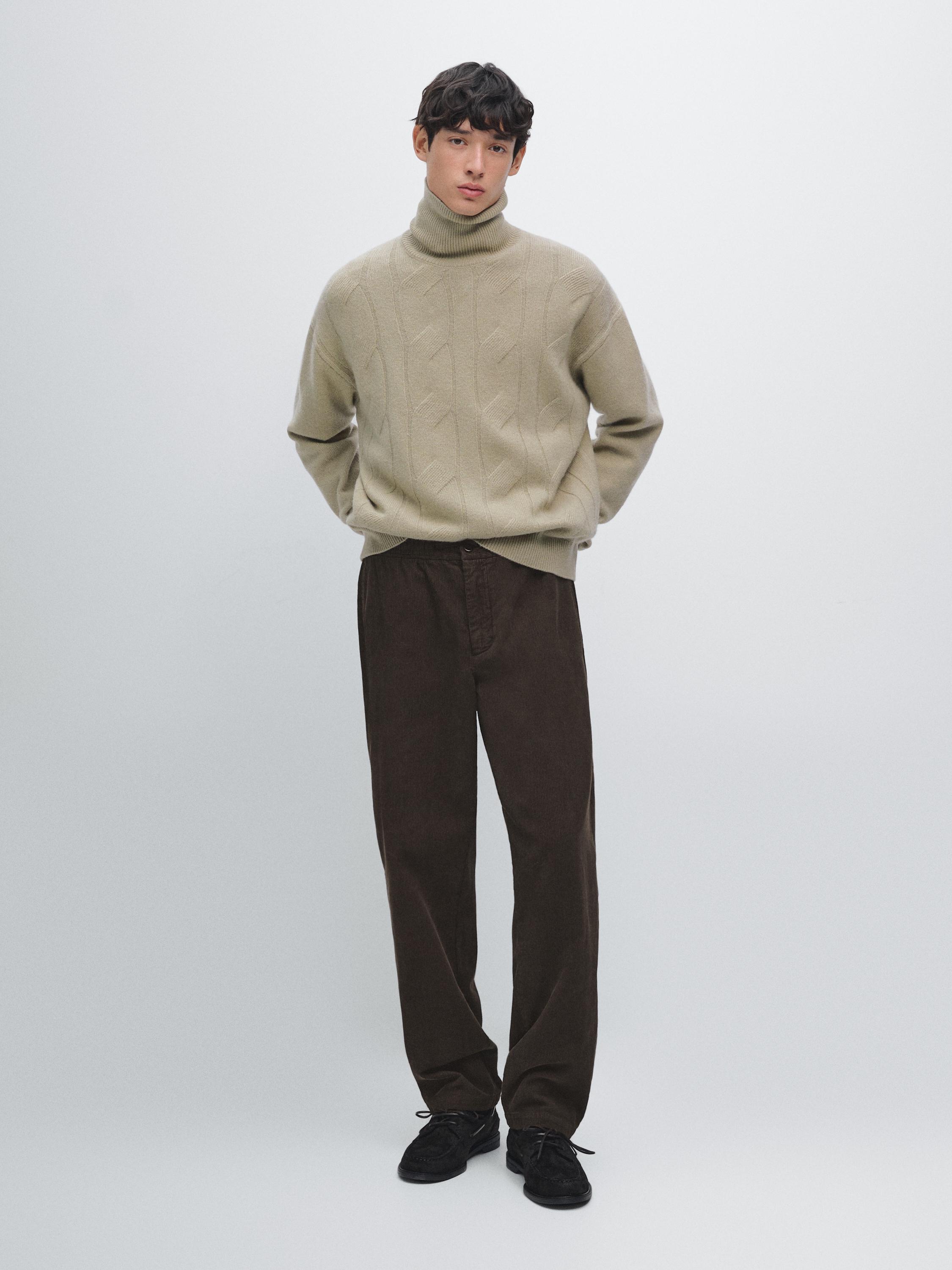 Wool blend knit sweater with high neck