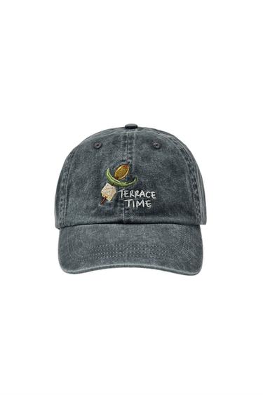 Front view of a grey washed-effect cap, with olive embroidery and "TERRACE TIME" text on the front. Adjustable back.