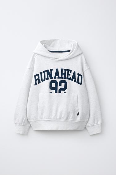SWEAT DE JOGGING À CAPUCHE ET INSCRIPTION - Gris perle de Zara