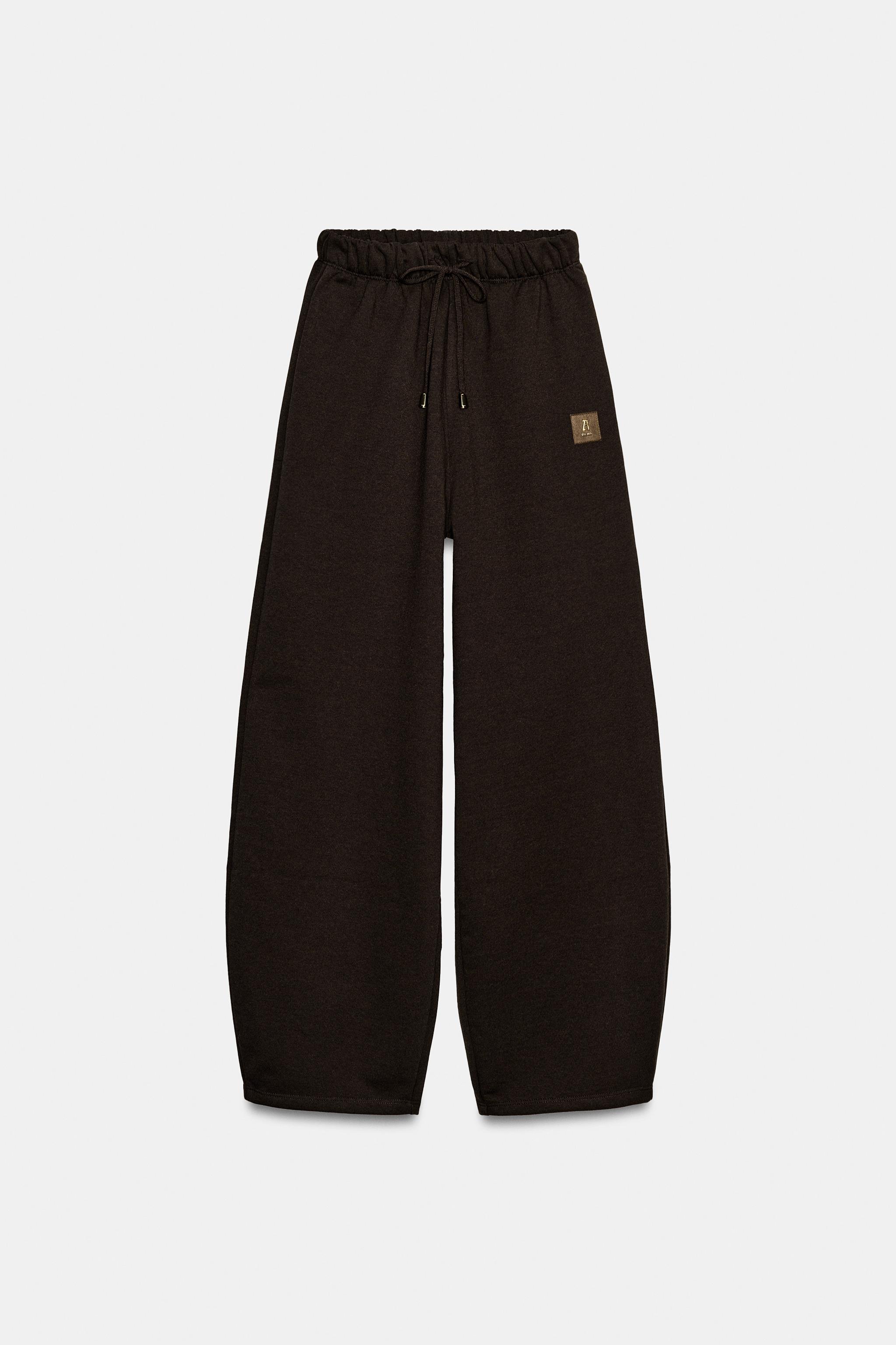 PANTALON EN MOLLETON AVEC PIÈCE