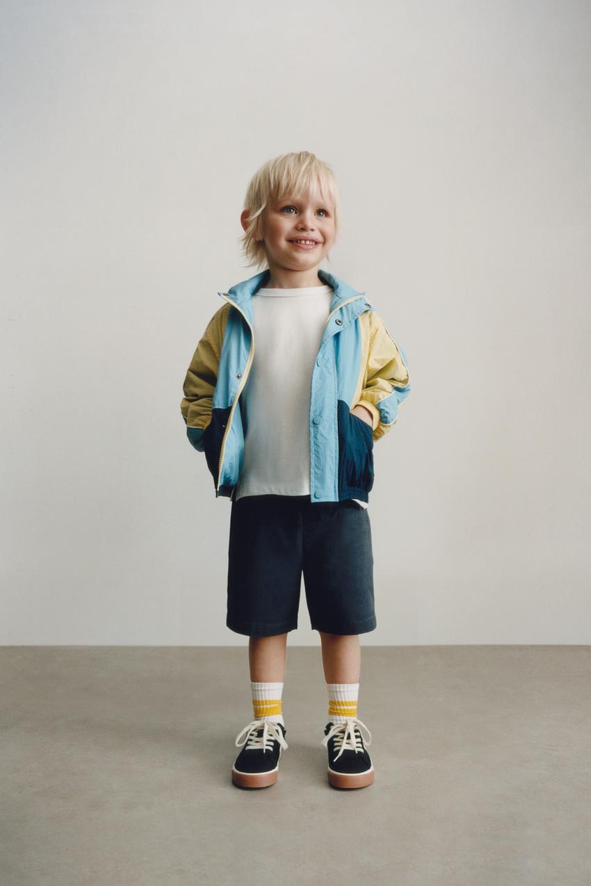 LIGHTWEIGHT TECHNICAL RAINCOAT