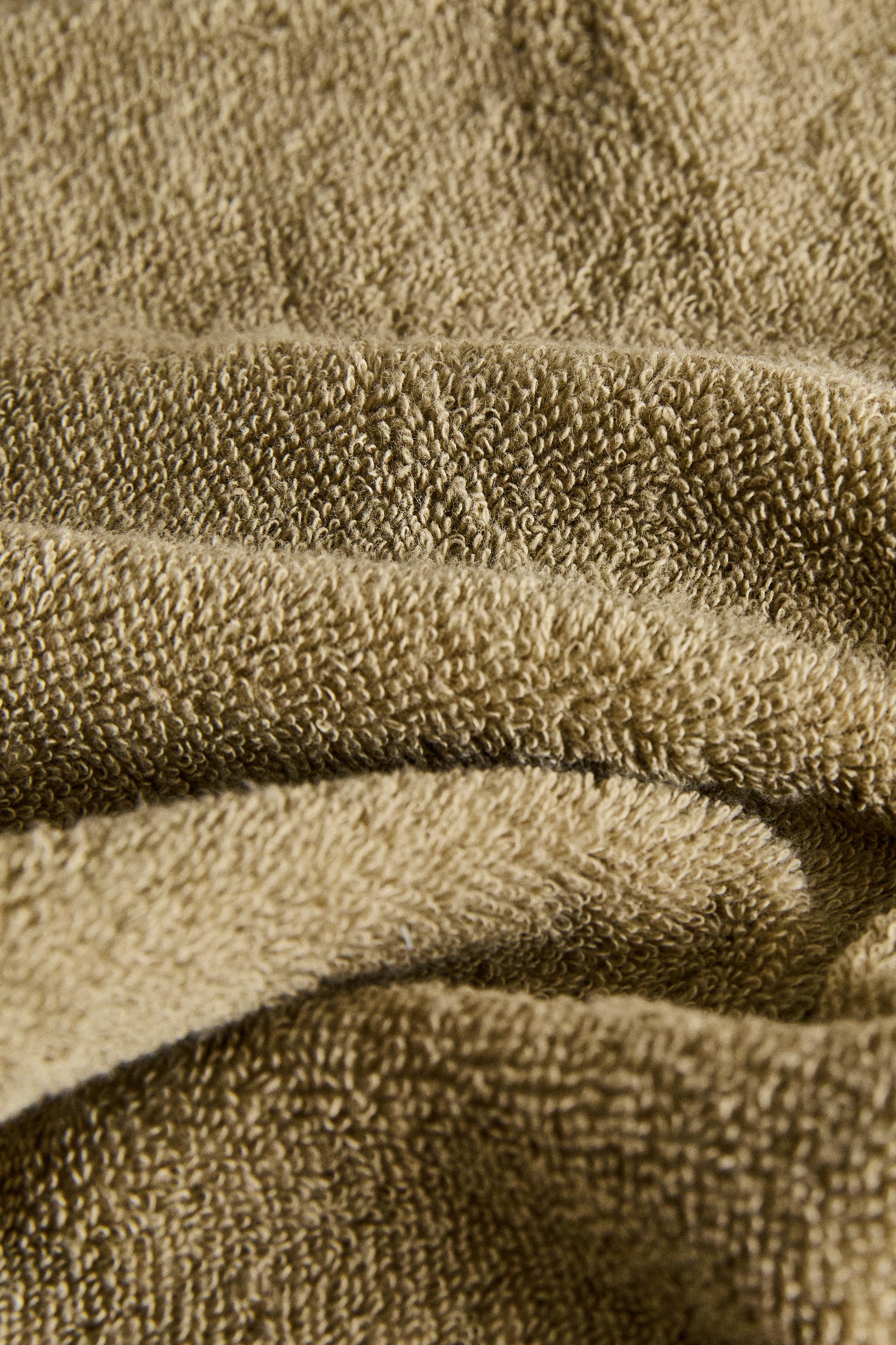SERVIETTE DE BAIN FRISE CONTRASTANTE