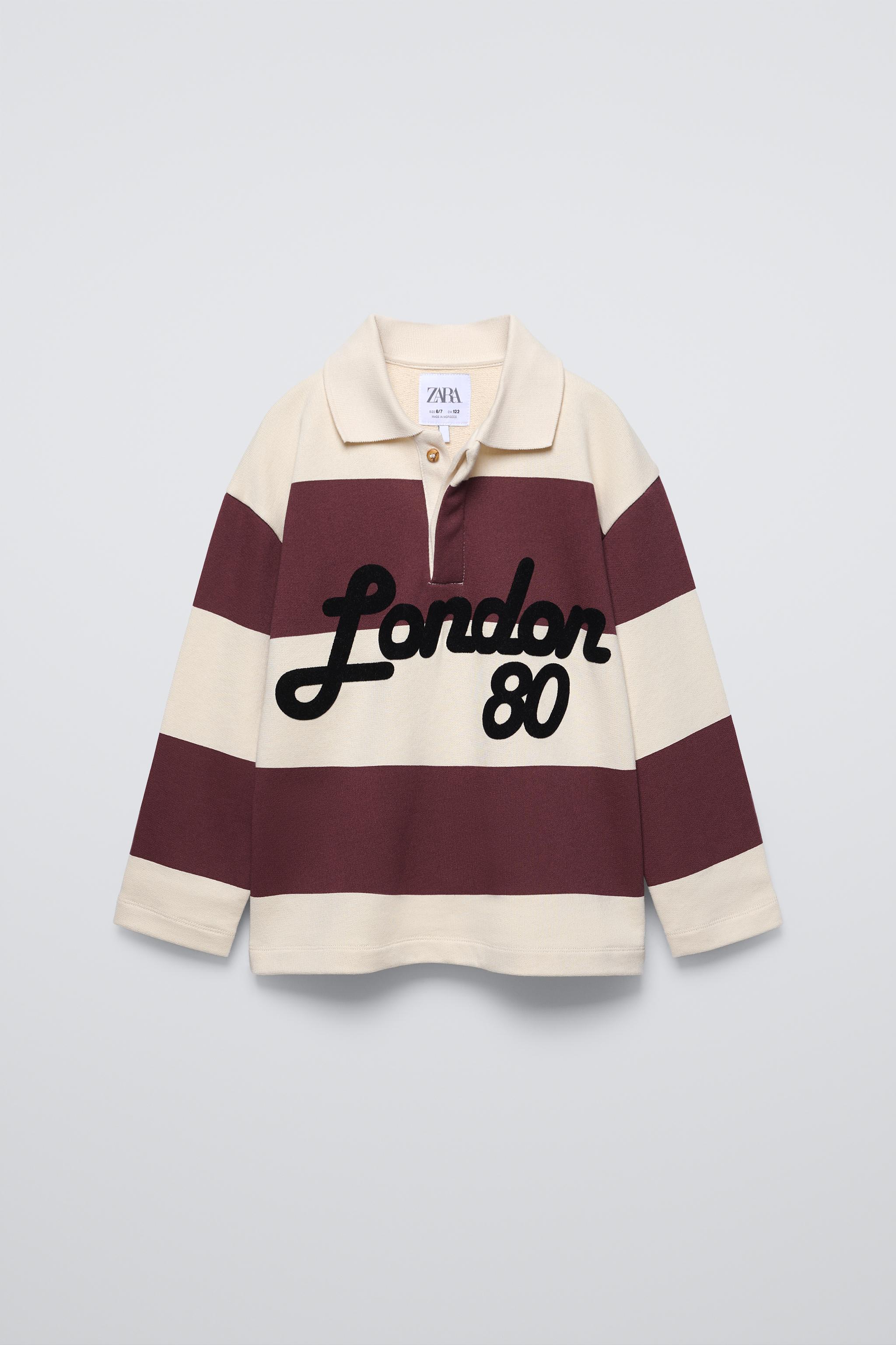 VARSITY STRIPE POLO SWEATSHIRT