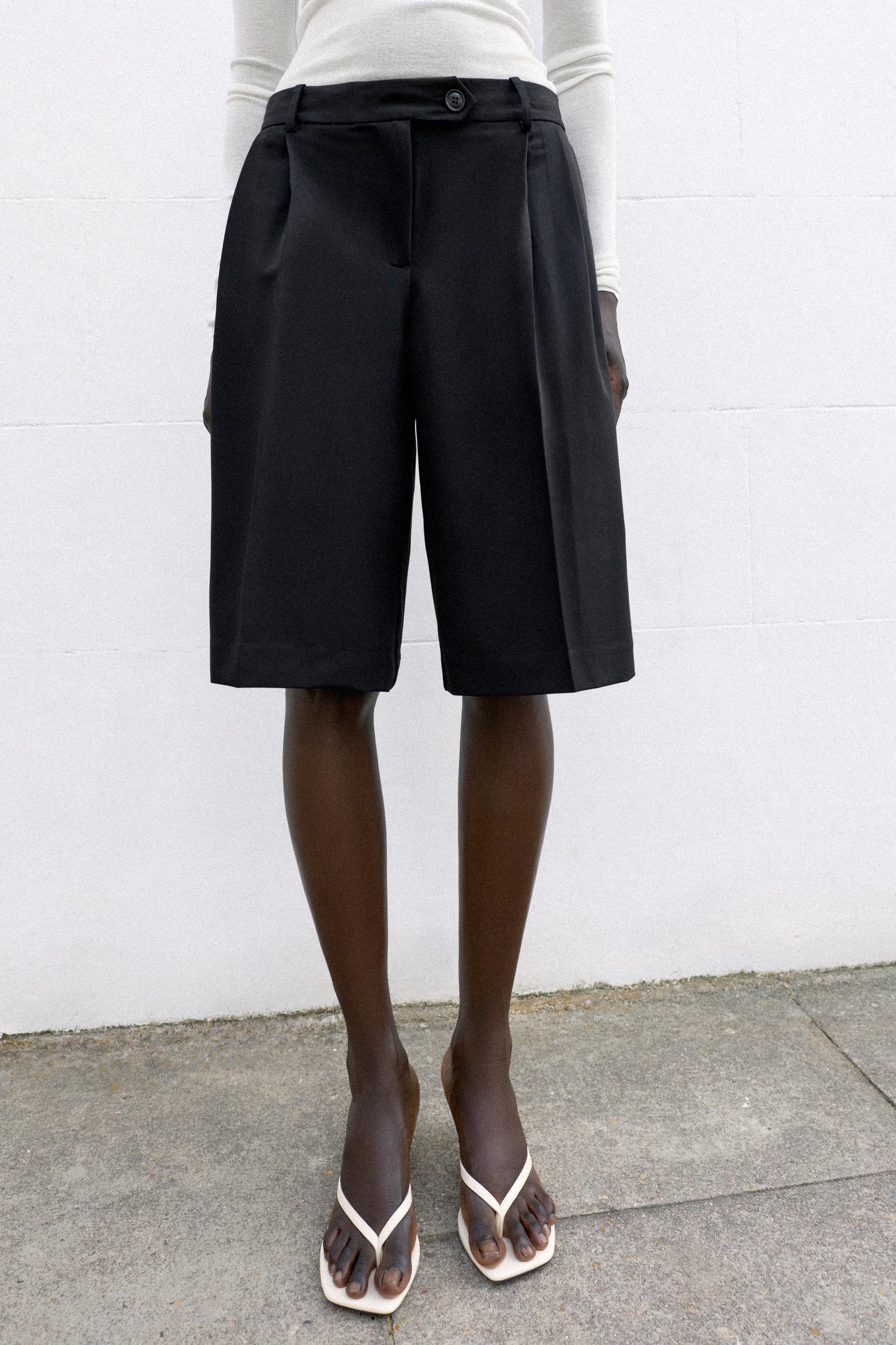 LONG PLEATED BERMUDA SHORTS