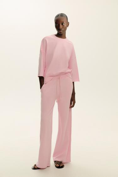 WASHED EFFECT TROUSERS - Pink by Zara
