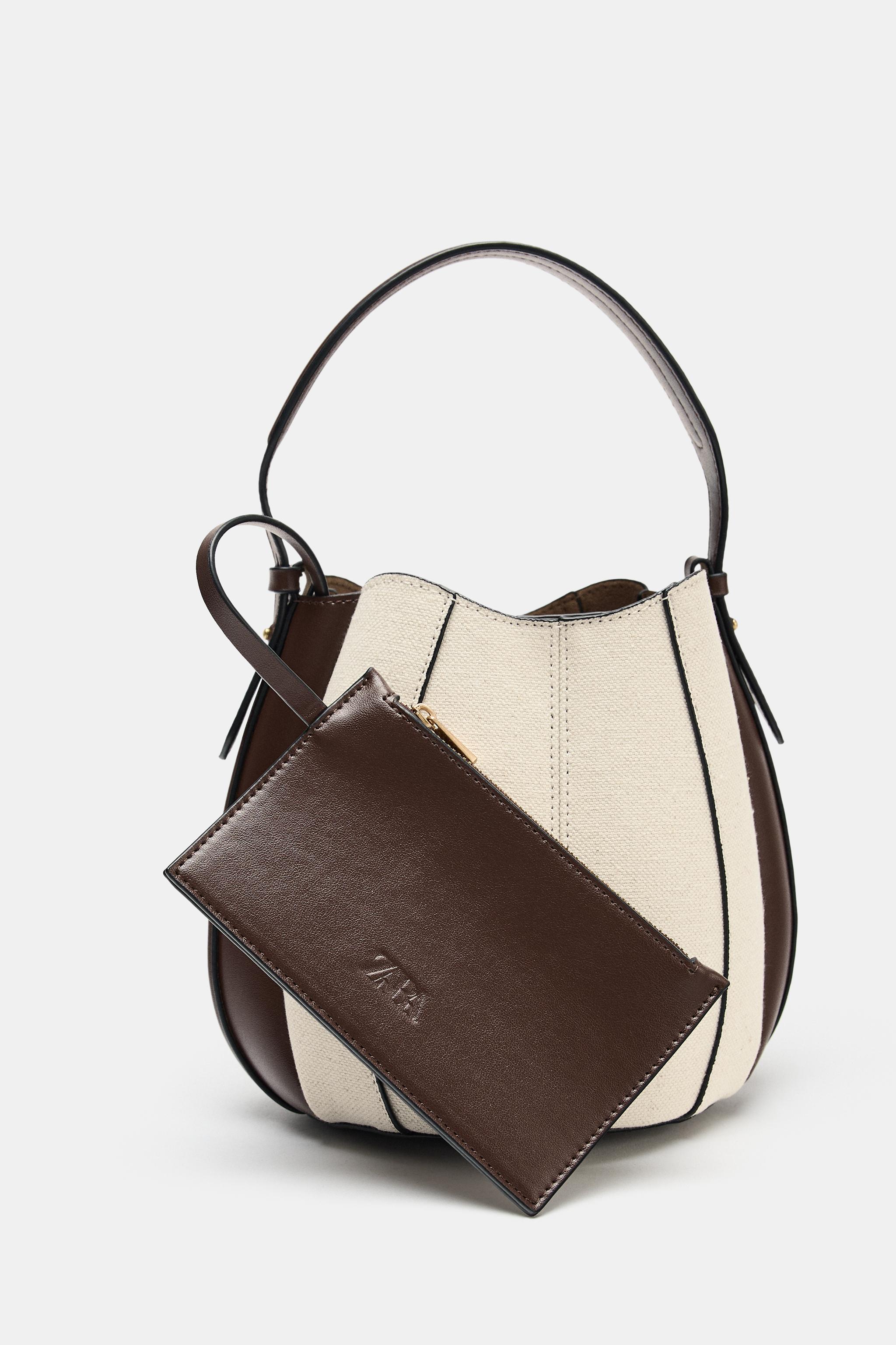 TOPSTITCHED BUCKET BAG