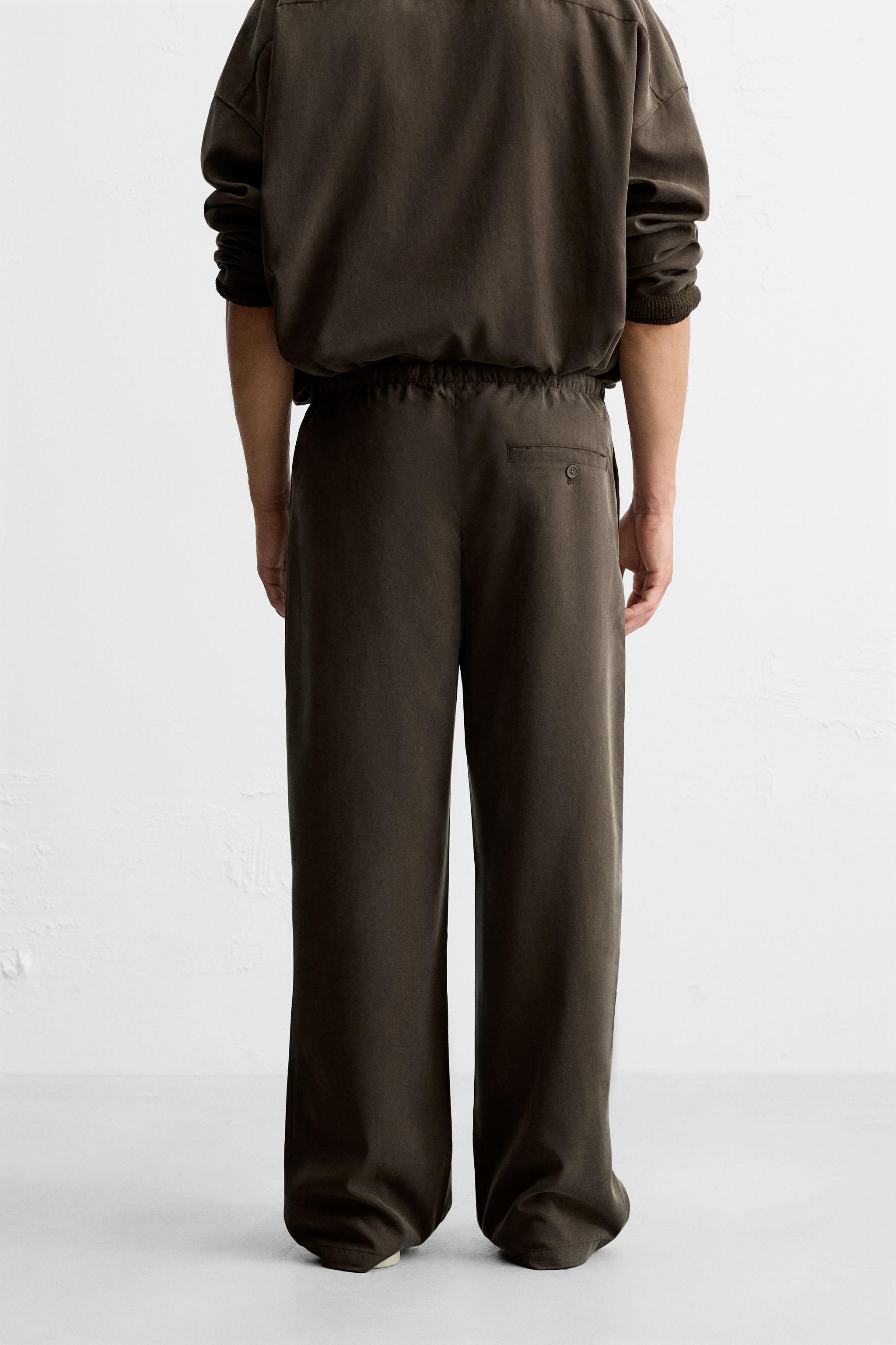 RELAXED FIT FLOWY PANTS