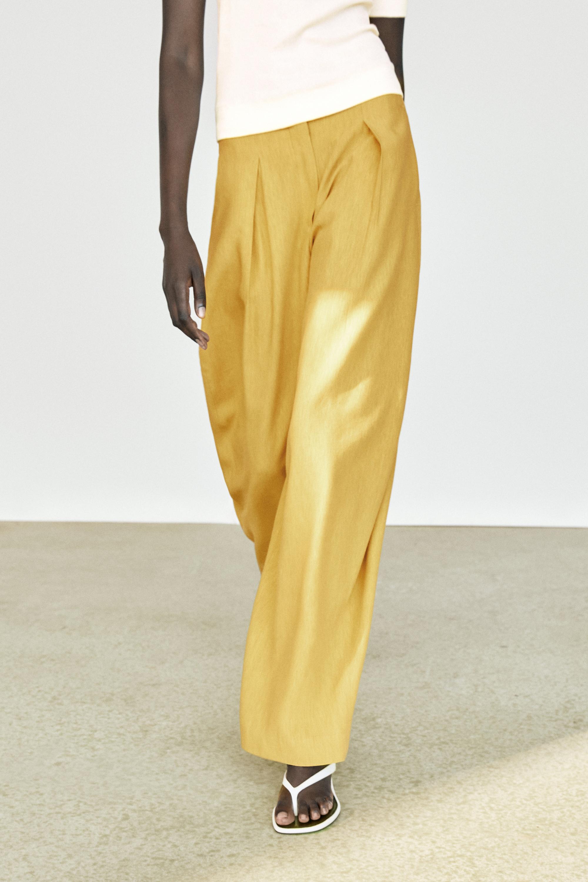 Wide-leg flowing linen blend pleated pants