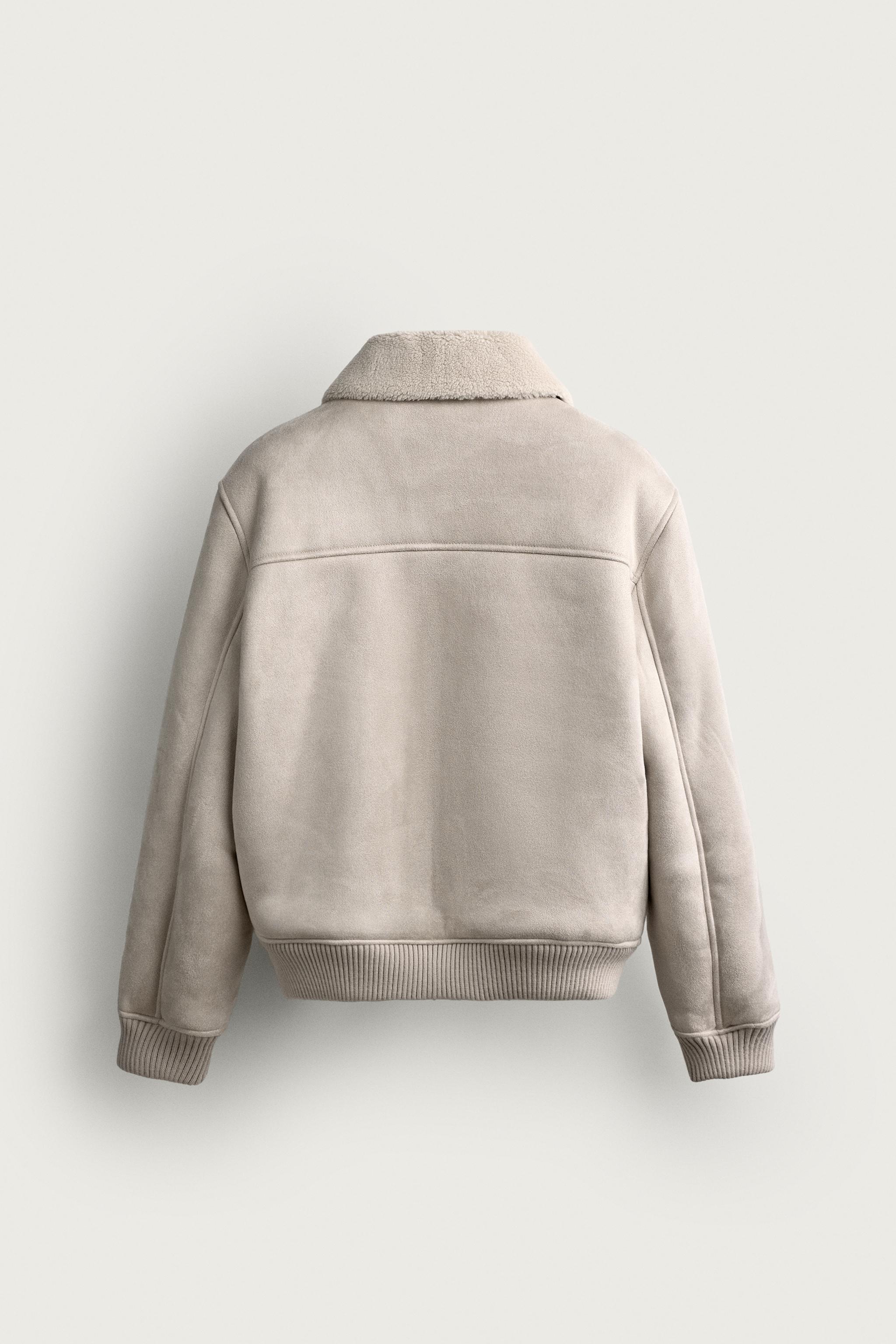 BLOUSON EN MATIÈRE SYNTHÉTIQUE BIMATIÈRE EFFET MOUTON