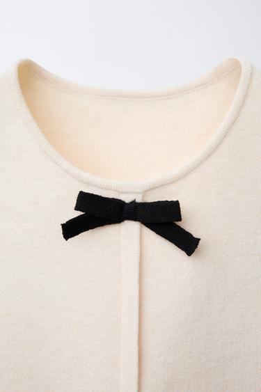 ROBE EN MAILLE AVEC NŒUDS - Écru / Noir de Zara - Image 2