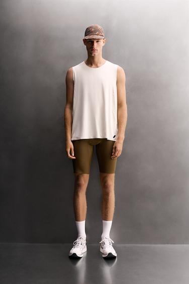 KORTE LØBETIGHTS - mellem grøn fra Zara - Billede 0