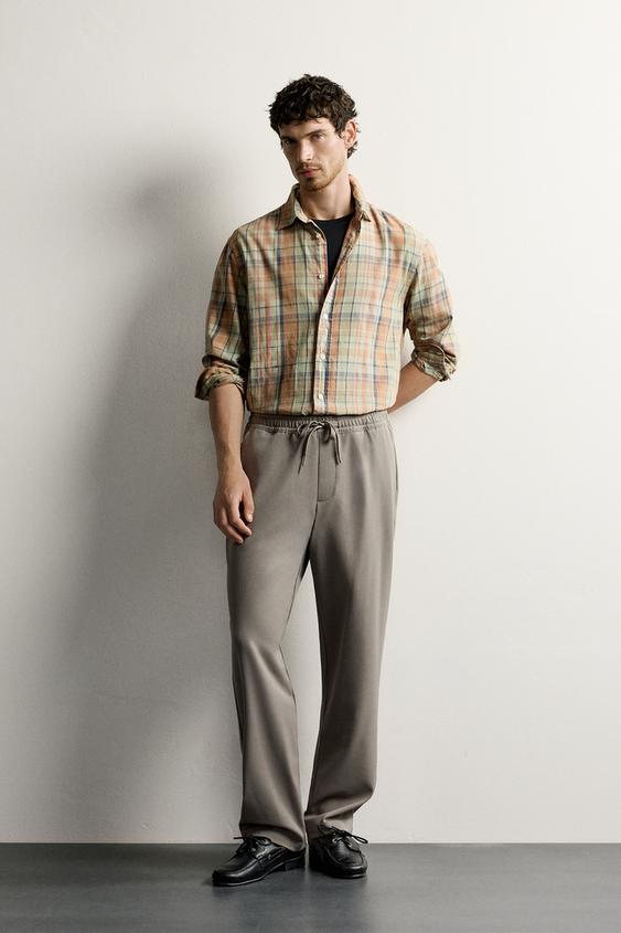 PANTALÓN REGULAR FIT CONFORT - Visón de Zara - Imagen 0
