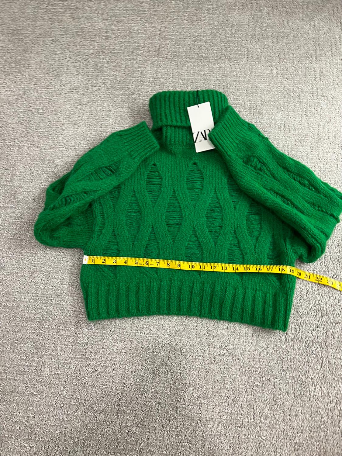 KNIT SWEATER WITH RIPS
