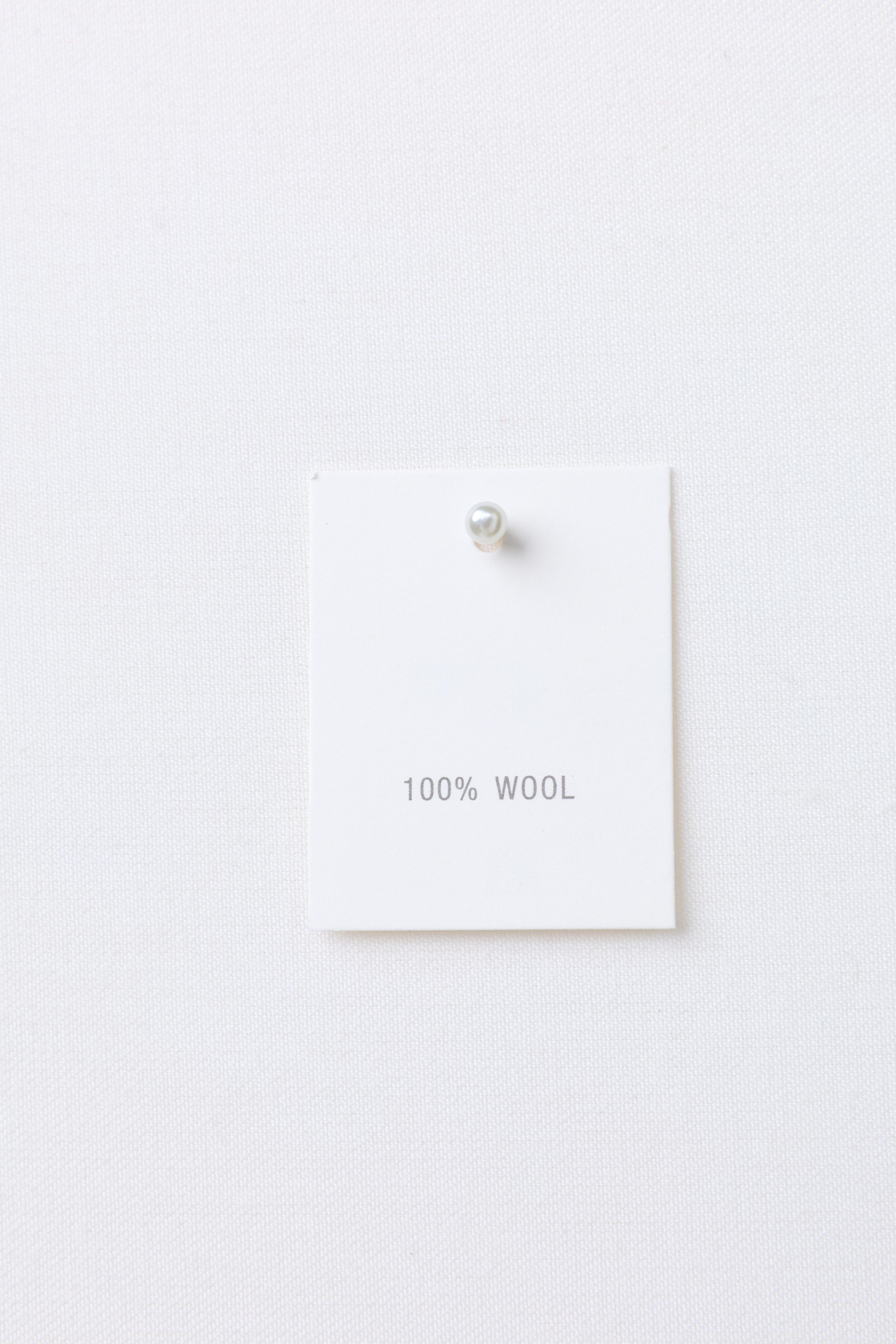 POLO EN MAILLE 100 % LAINE