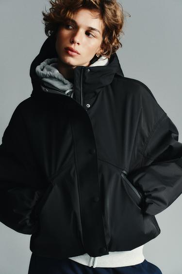 CHAQUETA CAPUCHA WATER REPELLENT WINDPROOF - Negro de Zara