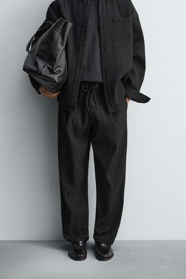 RELAXED FIT RAISED FABRIC TROUSERS - Black by Zara