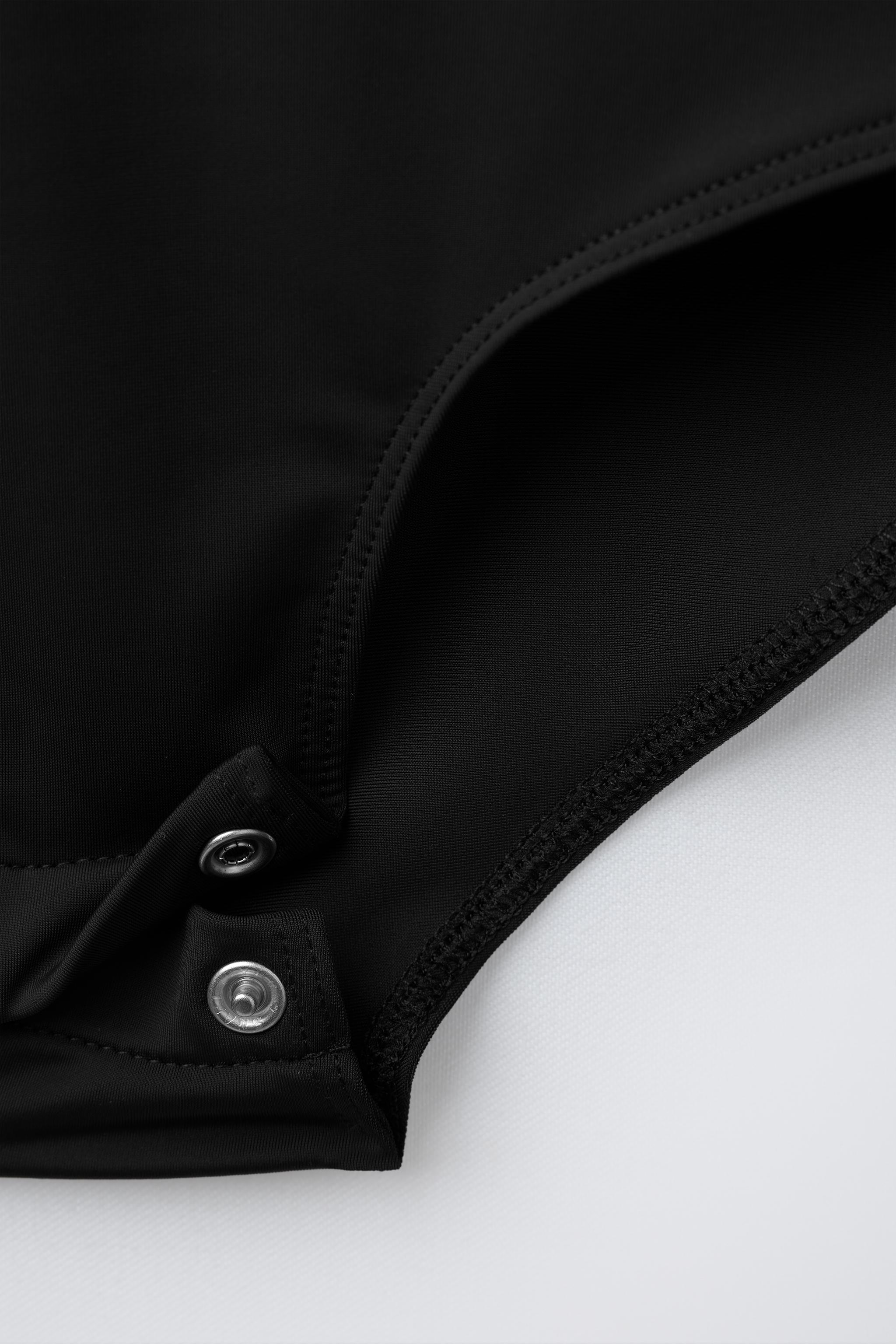 HIGH COLLAR BODYSUIT